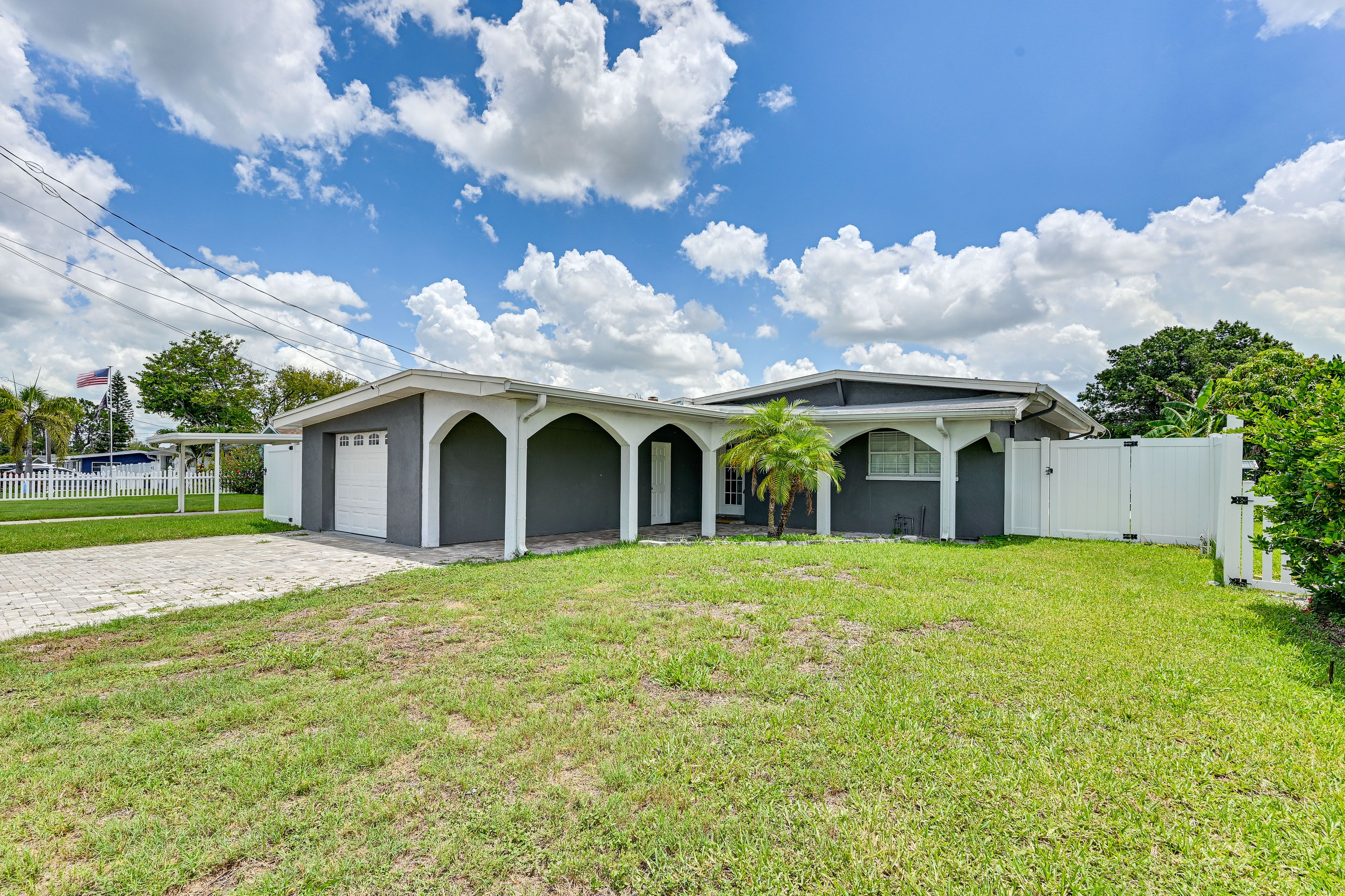 Garage (1 Vehicle) | Driveway (2 Vehicles) | Jet Ski/Boat Trailer Parking