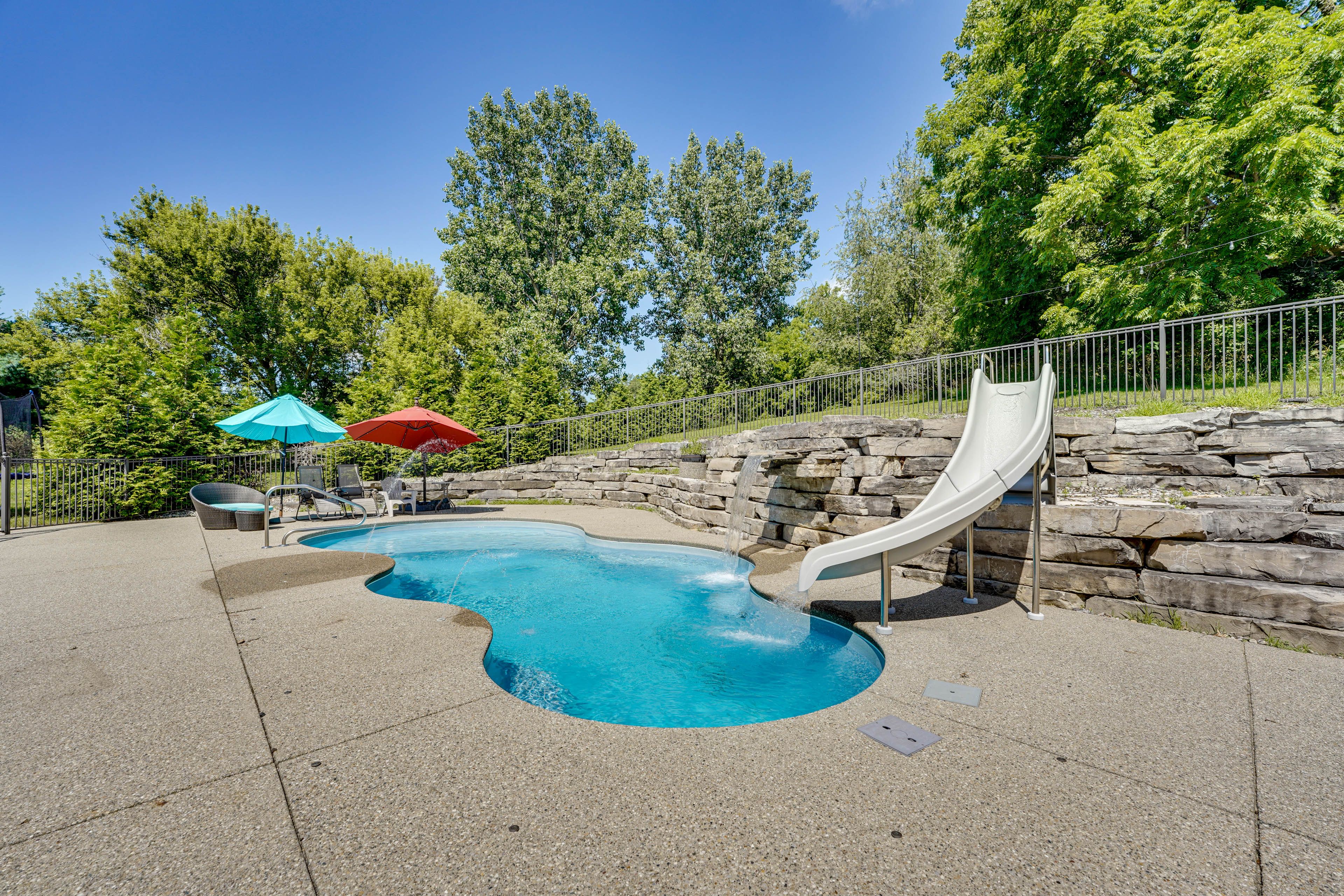 House Exterior | Heated Pool w/ Waterslide & Waterfall