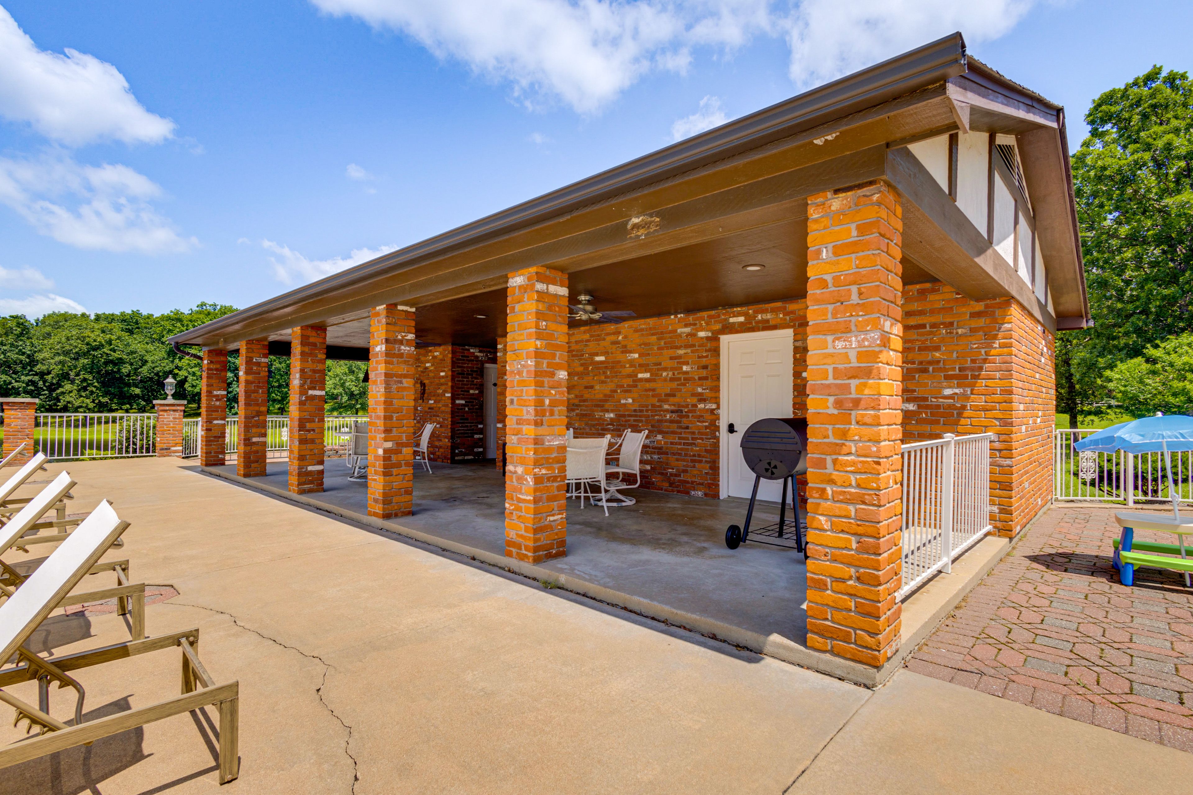 Covered Patio | Charcoal Grill | 2 Half Bathrooms