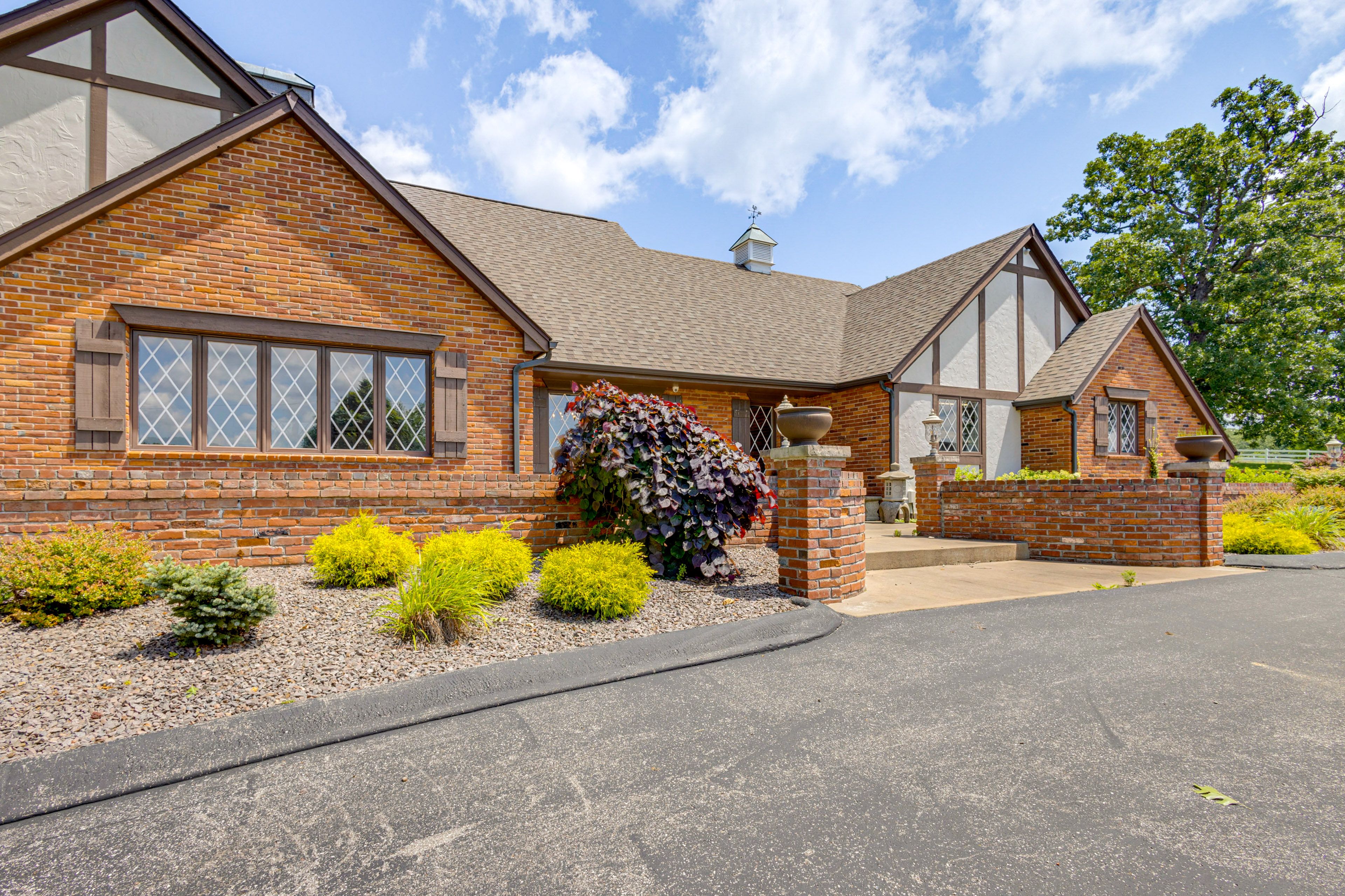 Front Exterior | Parking | Driveway (8 Vehicles) | EV Charger