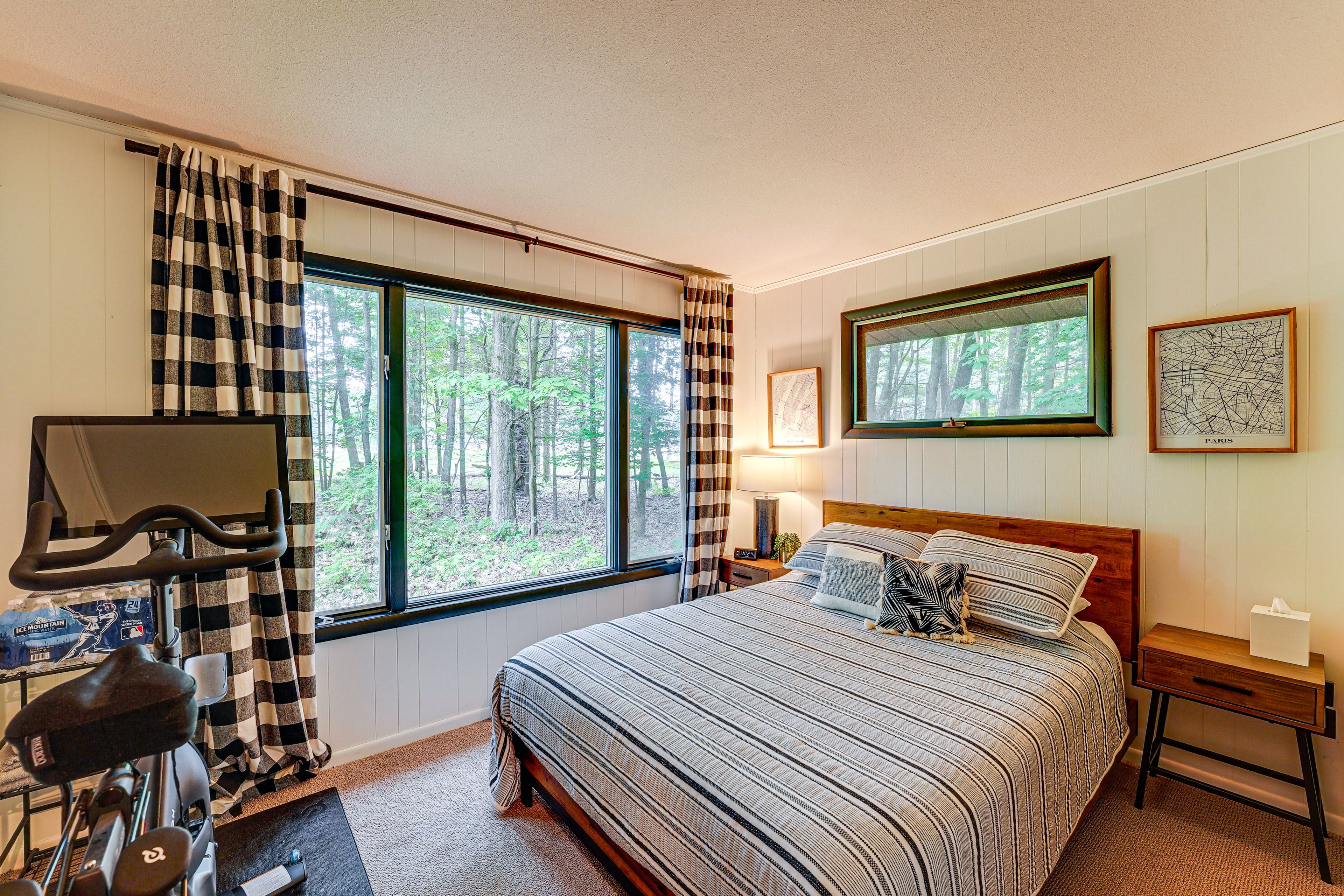 Bedroom 1 | Main Floor | Queen Bed | Linens Provided | Peloton Bike