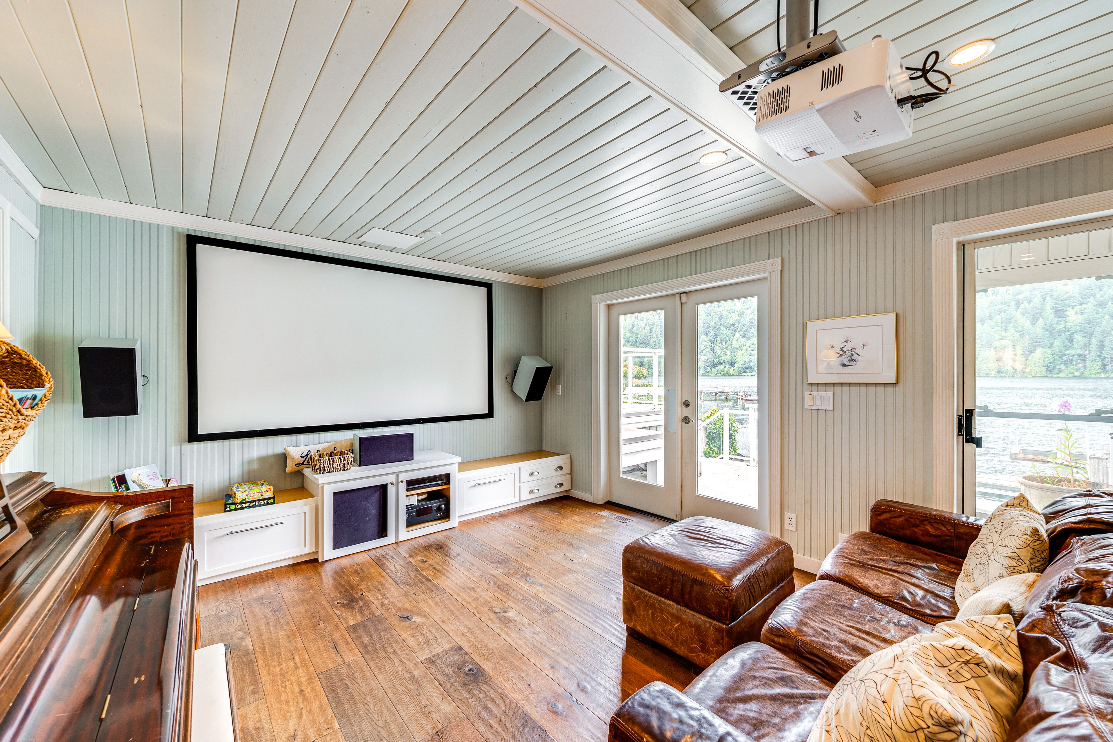 Living Area | Projector Screen | Home Theater System | Piano | Main Floor
