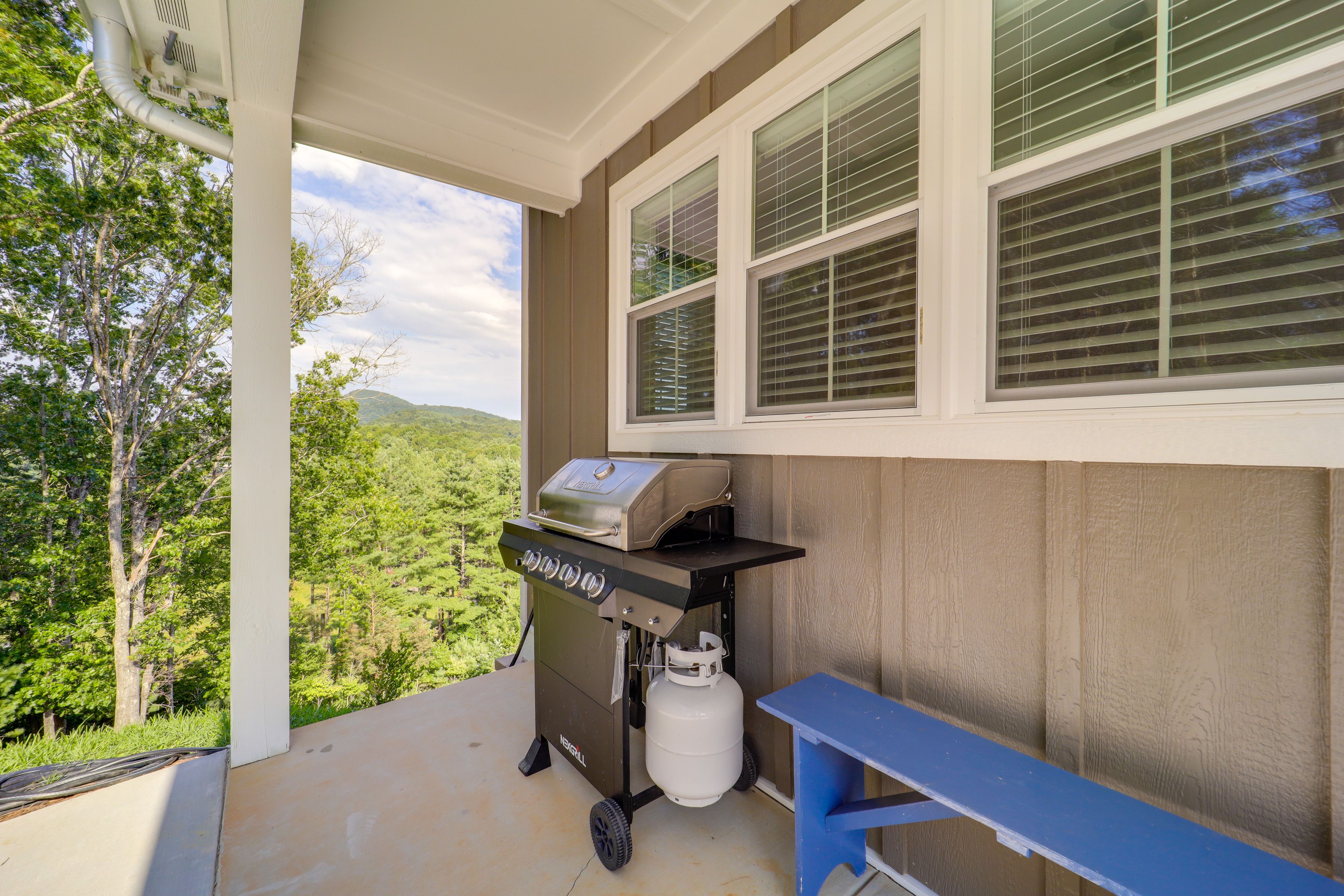 Covered Front Porch | Rocking Chairs | Gas Grill