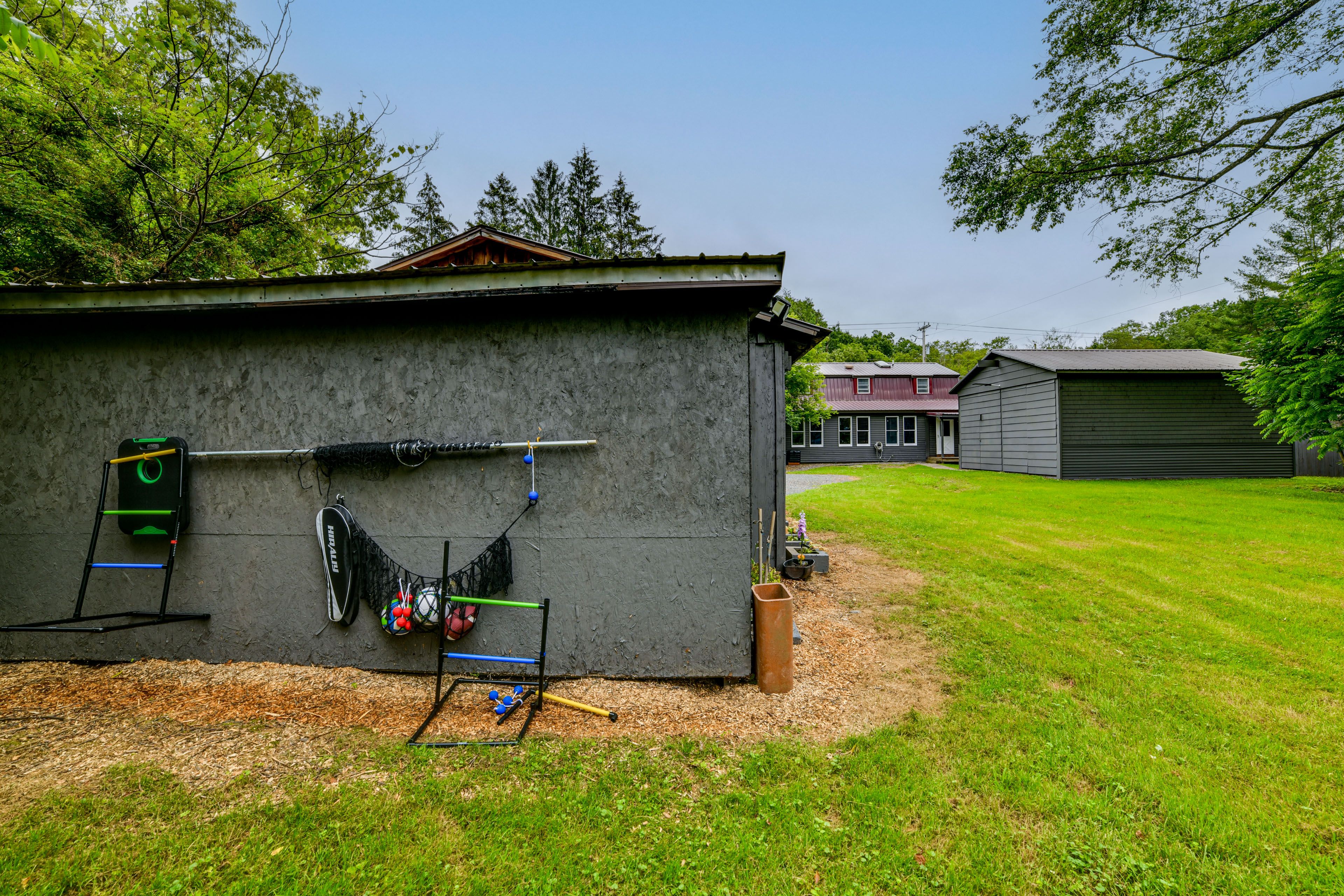 House Exterior | Spacious Yard w/ Games
