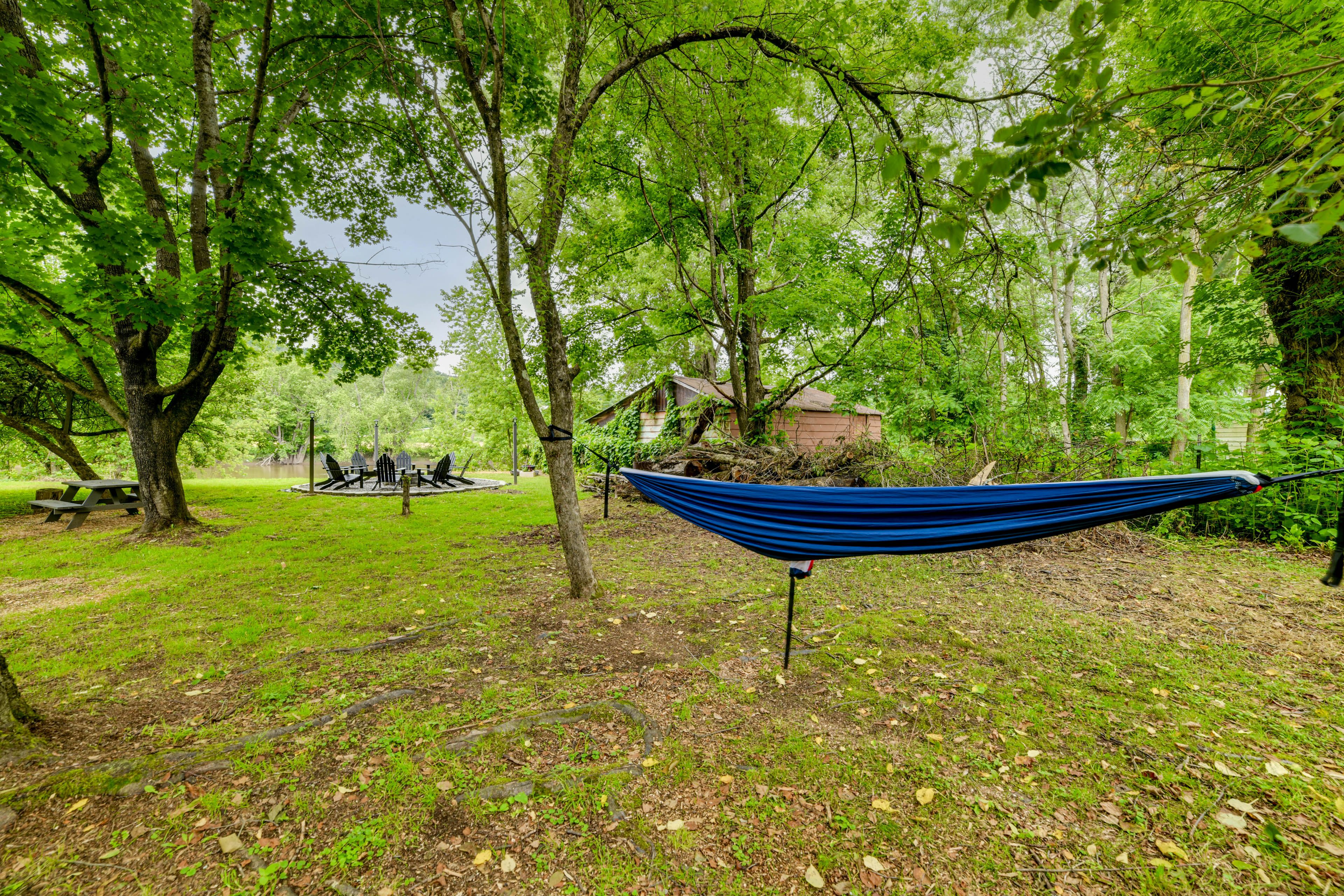 House Exterior | Hammock | Wood-Burning Fire Pit | River Views & Access