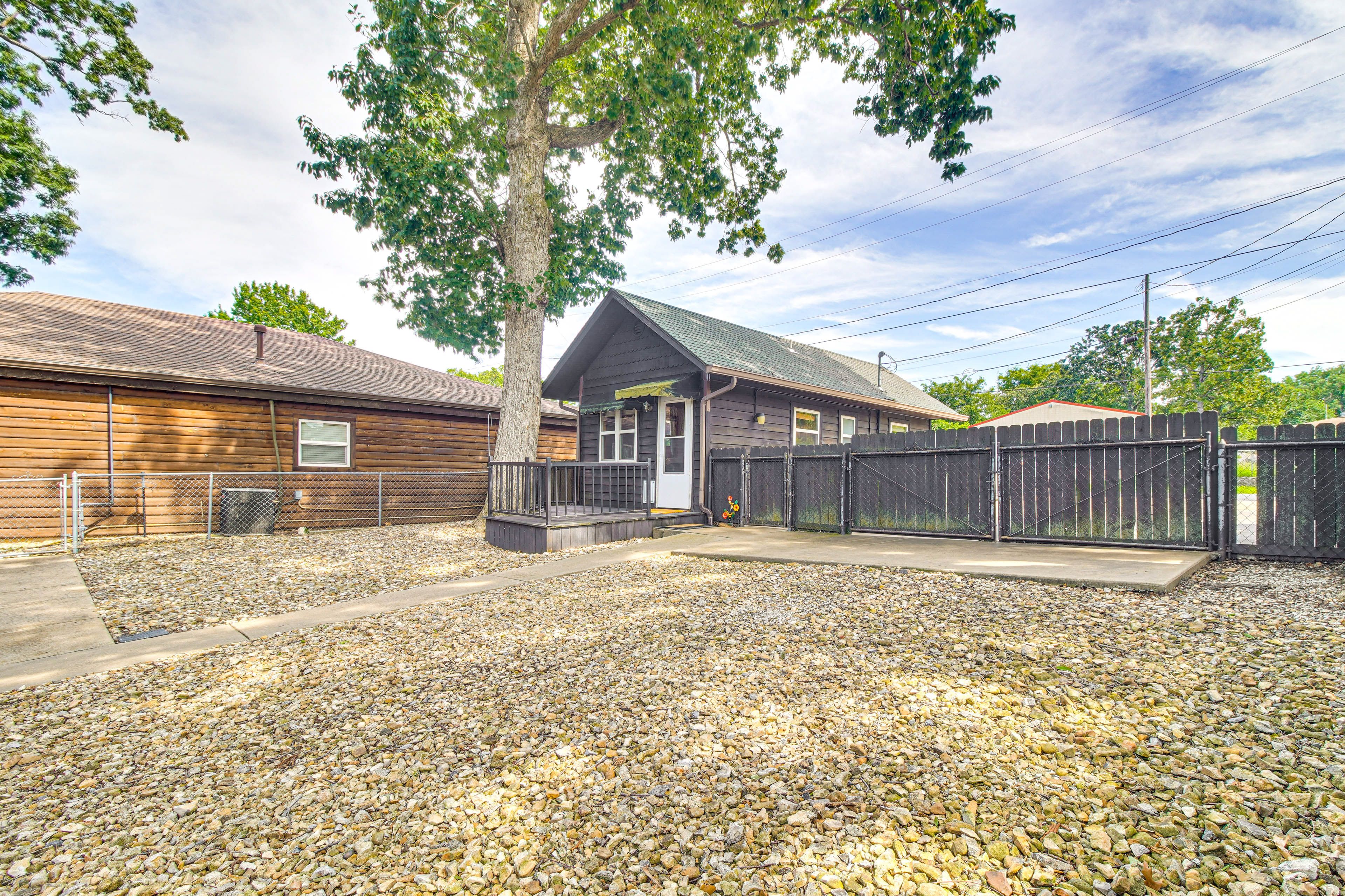 Cabin Exterior | Fenced Gravel Yard