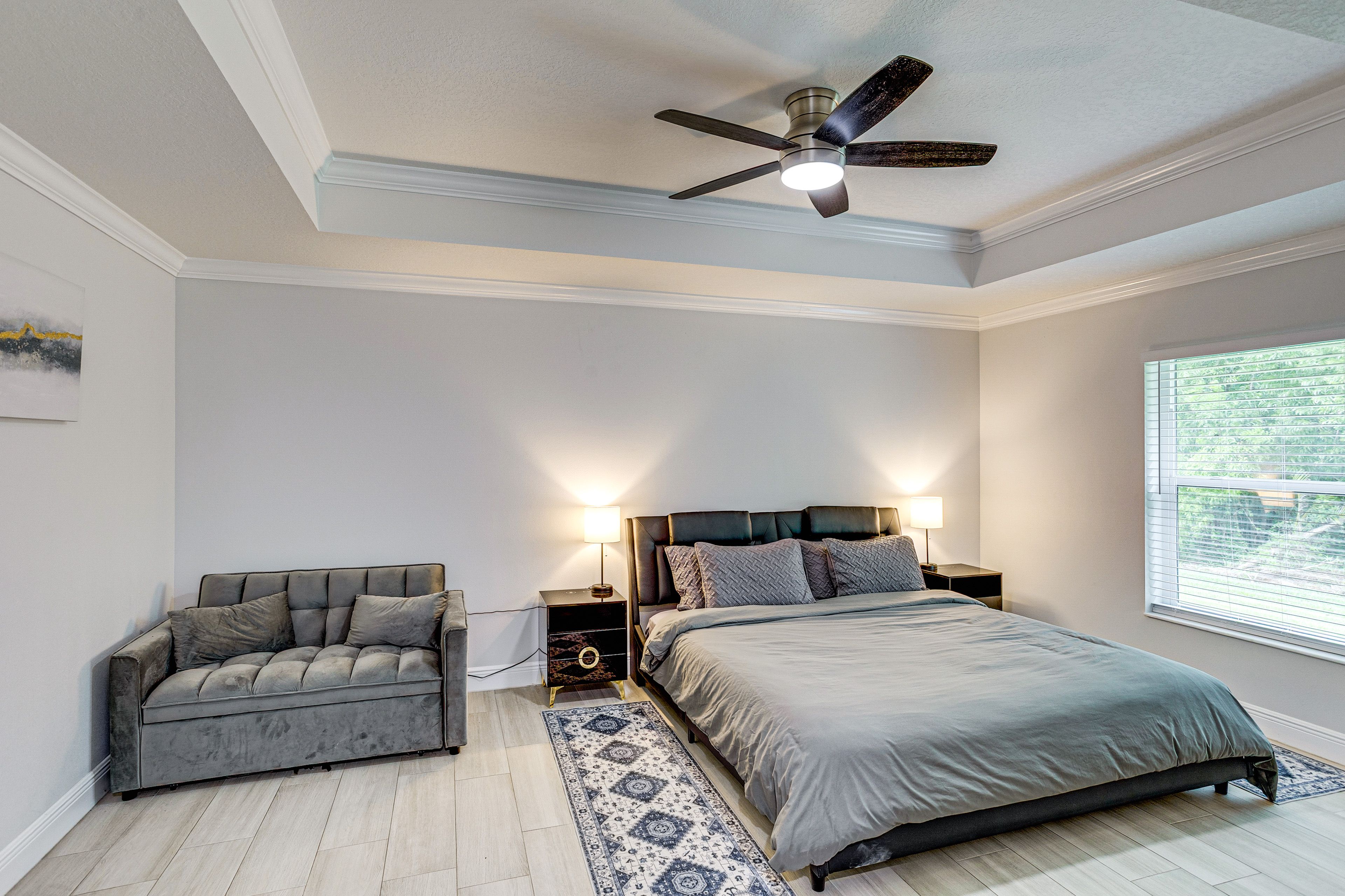 Bedroom 1 | King Bed | Sleeper Sofa | Linens Provided | Dedicated Workspace Area