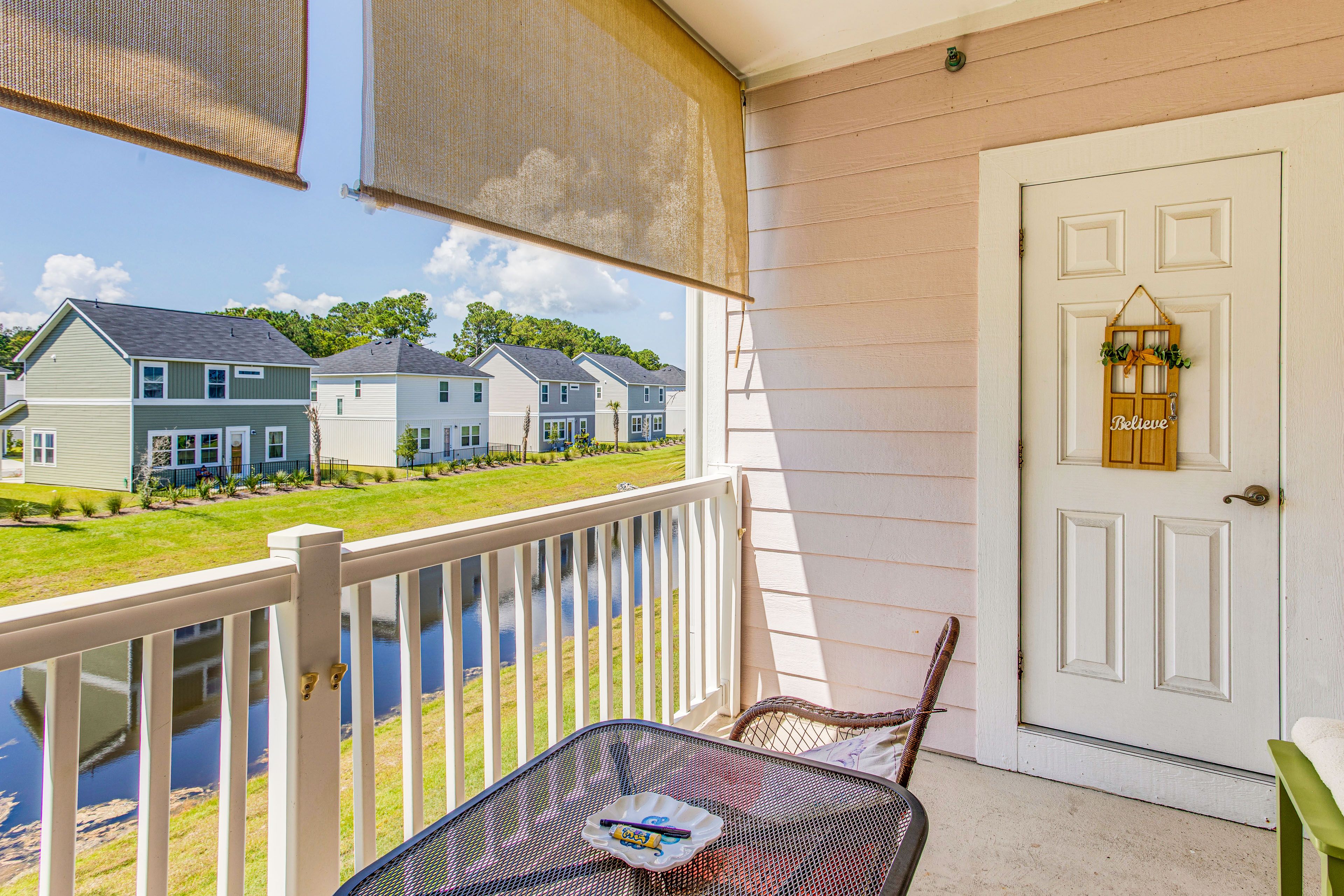 Balcony | Outdoor Dining Area | Electric Fireplace | Pool Views
