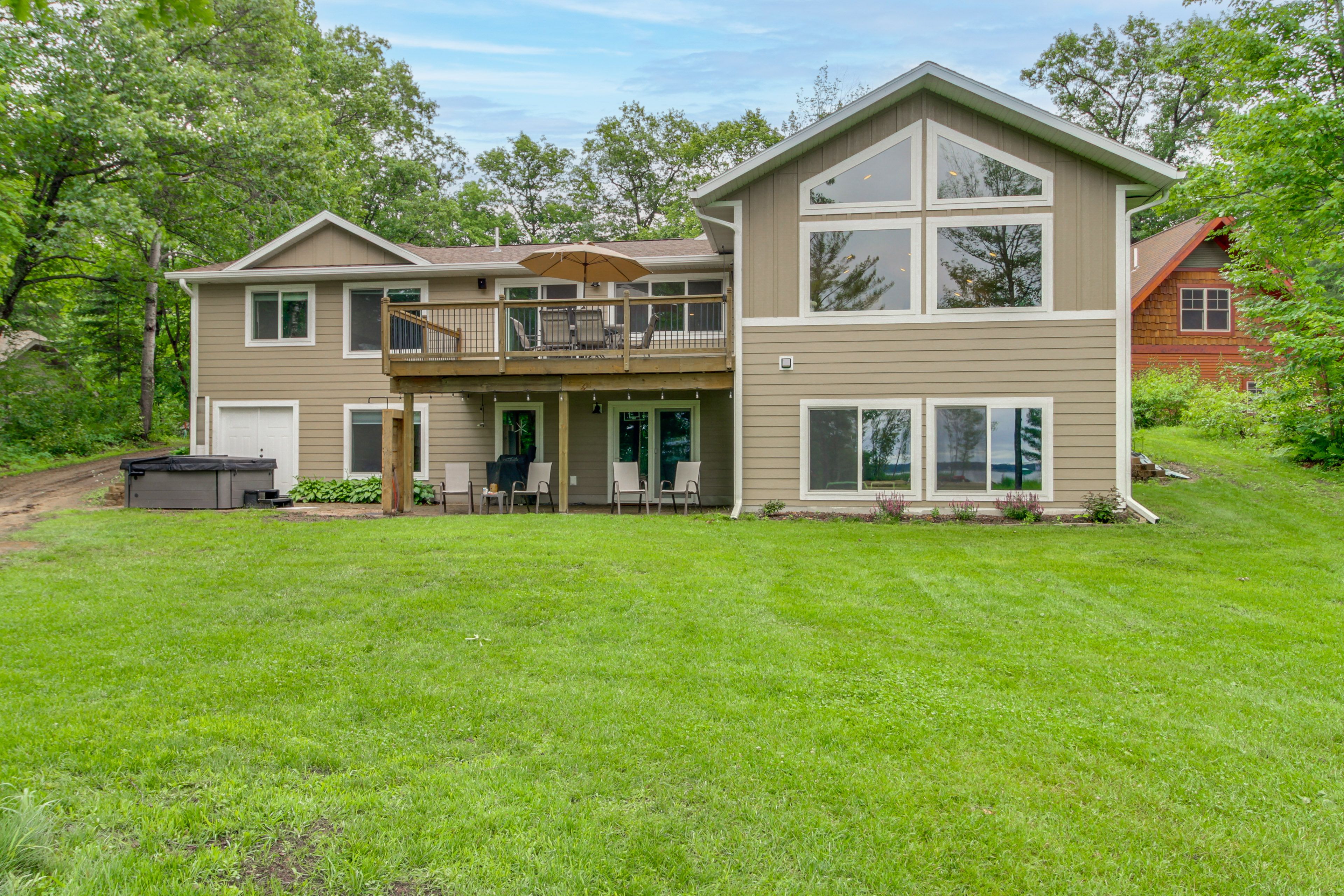 Main House Exterior | Private Hot Tub | Yard Games | Furnished Deck | Gas Grill