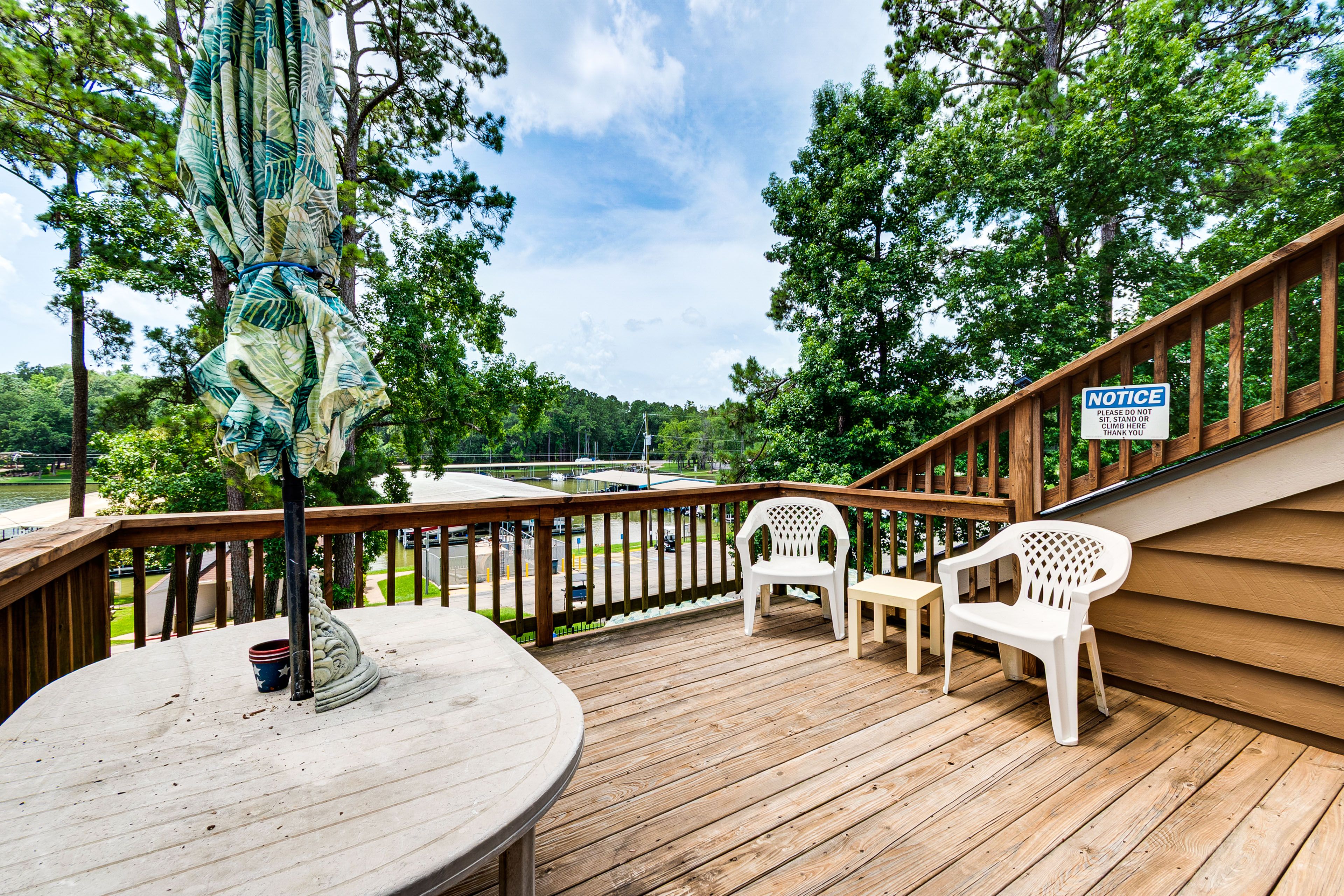 Furnished Deck | Lake & Marina View | 3 Mi to Wolf Creek Park