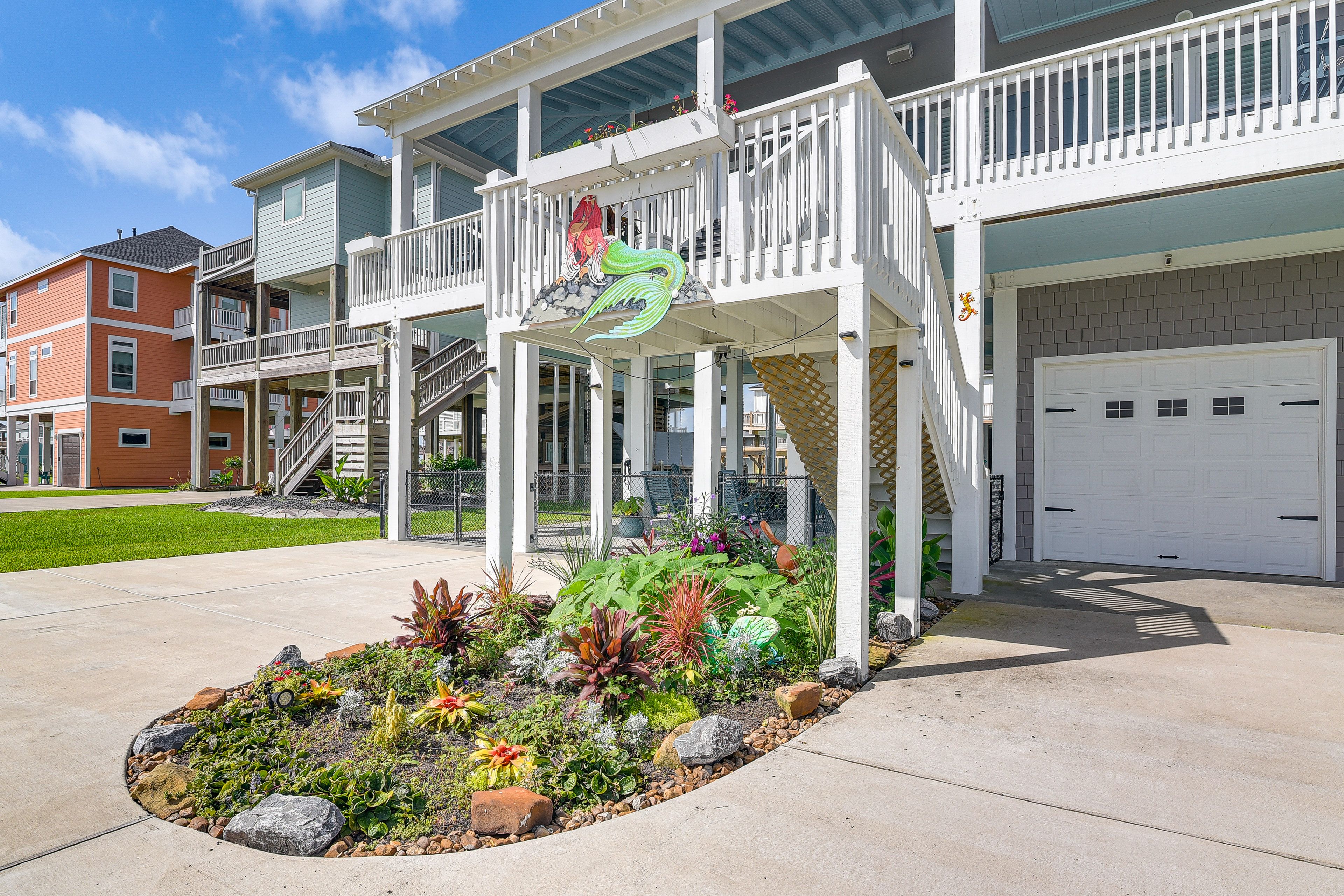 Property Exterior | 2-Story Home | Fenced-In Yard | Furnished Balconies