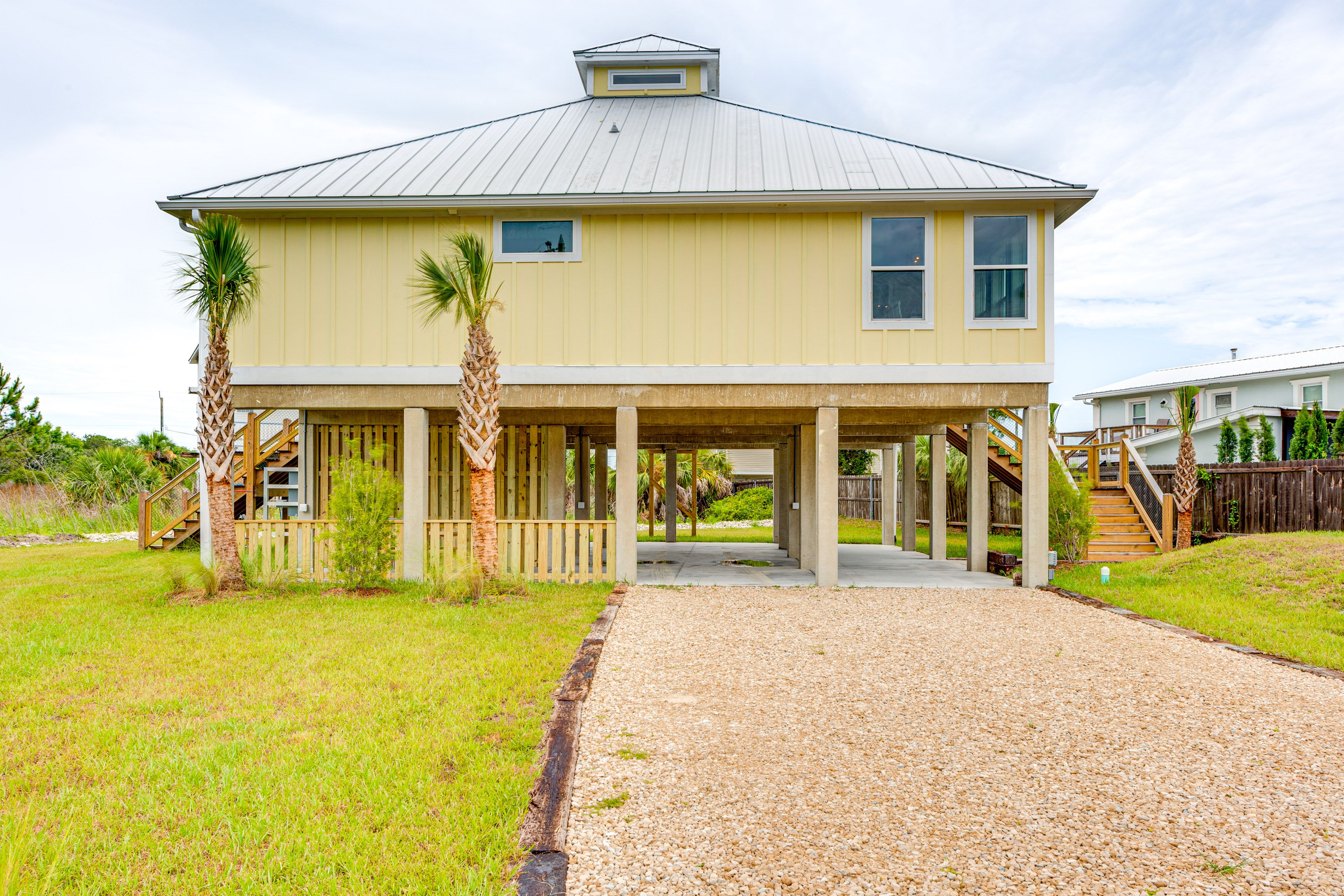 St George Island Vacation Rental | 3BR | 3BA | 1,500 Sq Ft | Staircase to Enter