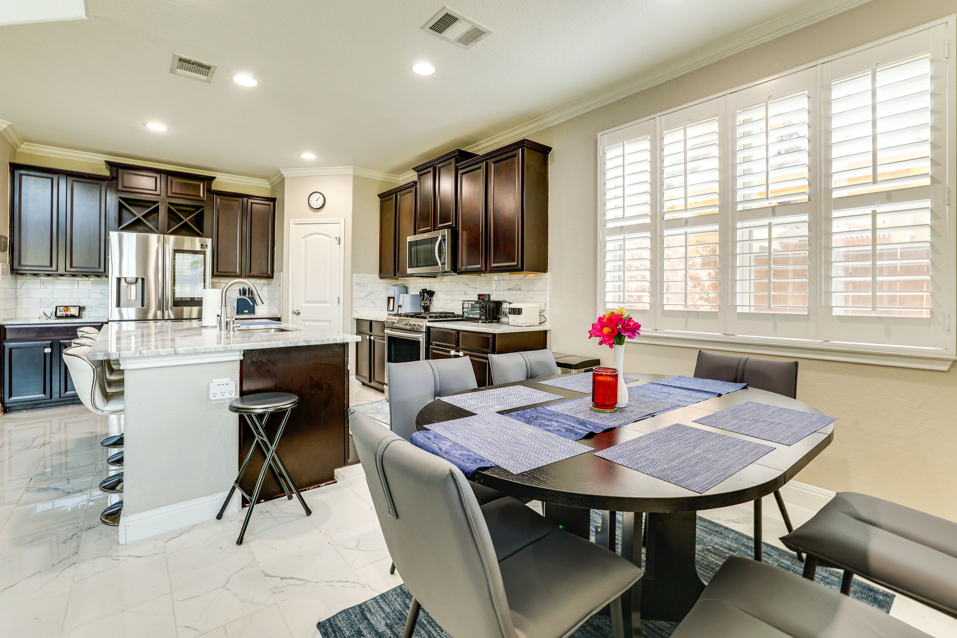 Dining Area | Dishware & Flatware | Central A/C & Heat | 1st Floor