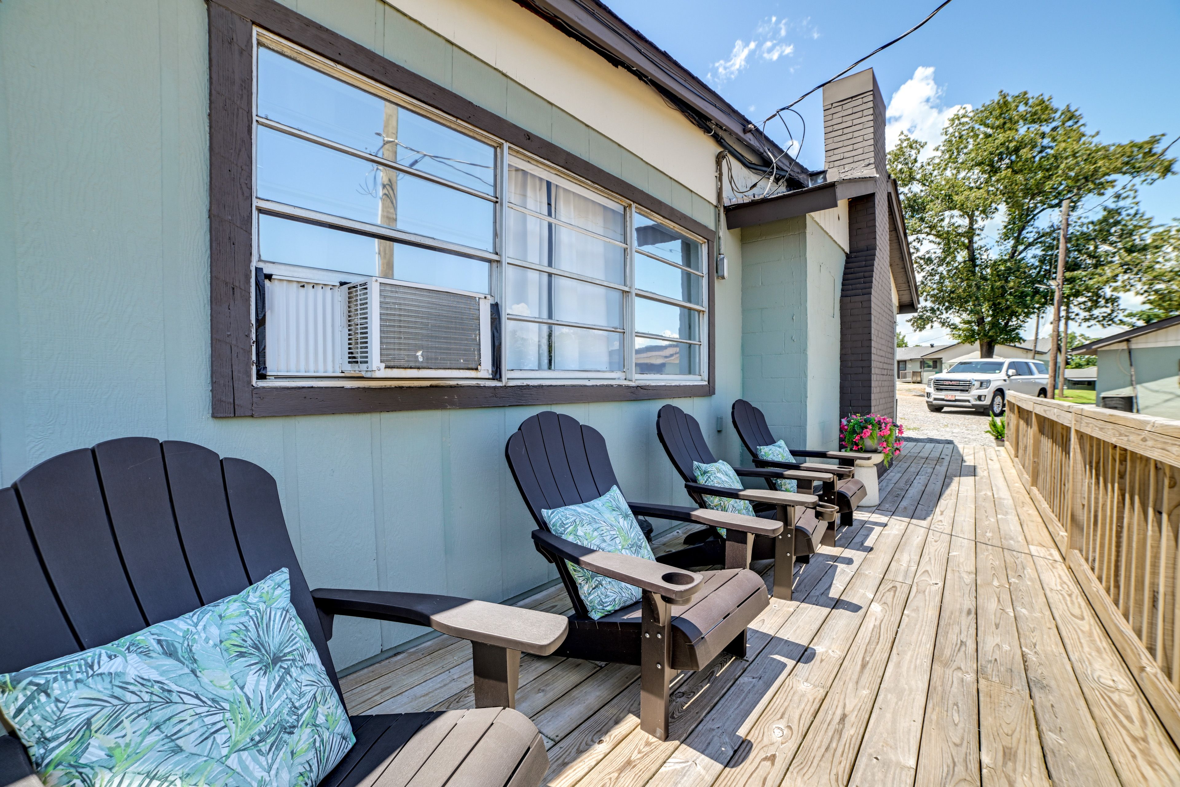 Cottage Exterior | Furnished Deck | Charcoal Grill