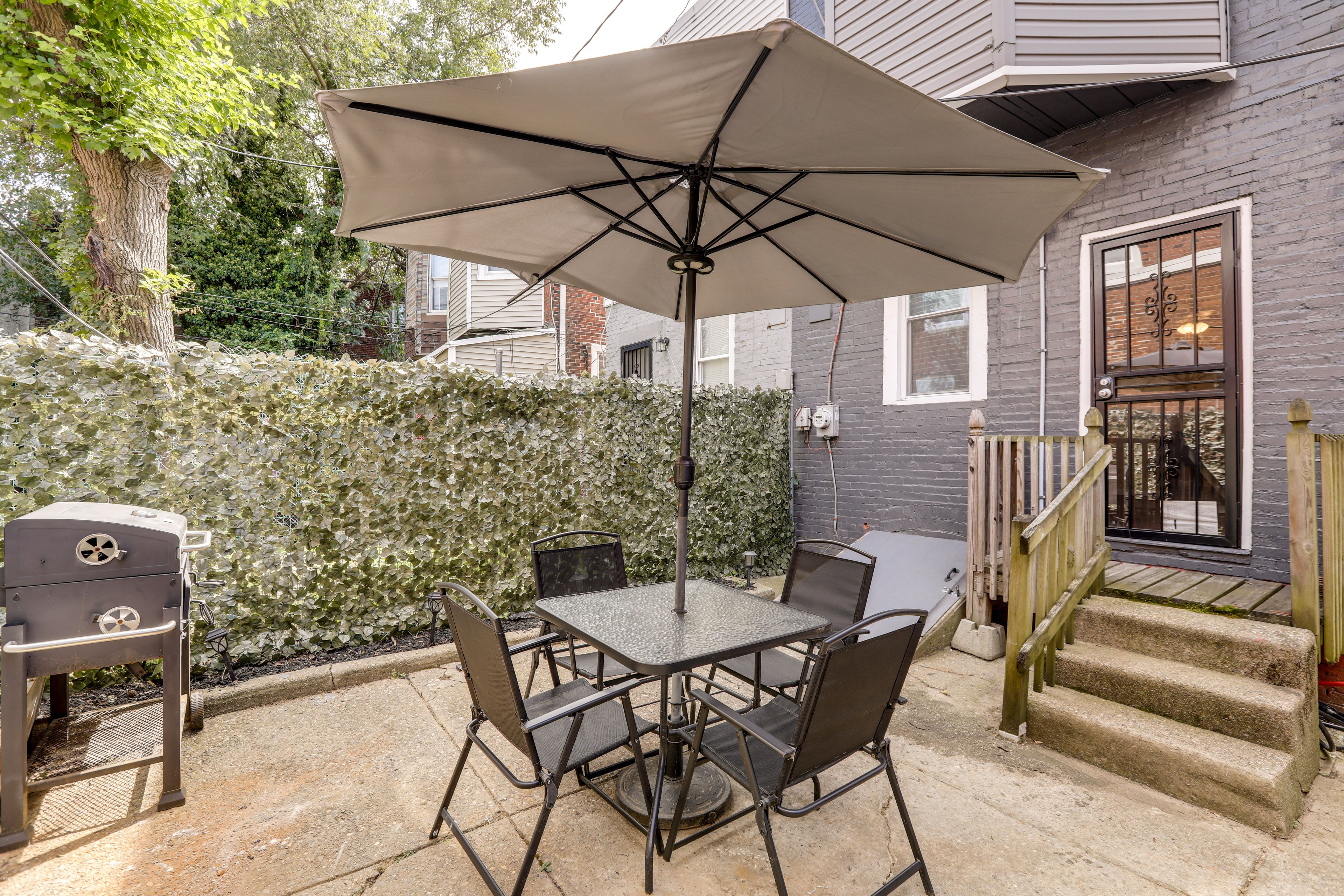 Private Urban Oasis | Outdoor Dining Area | Charcoal Kettle Grill