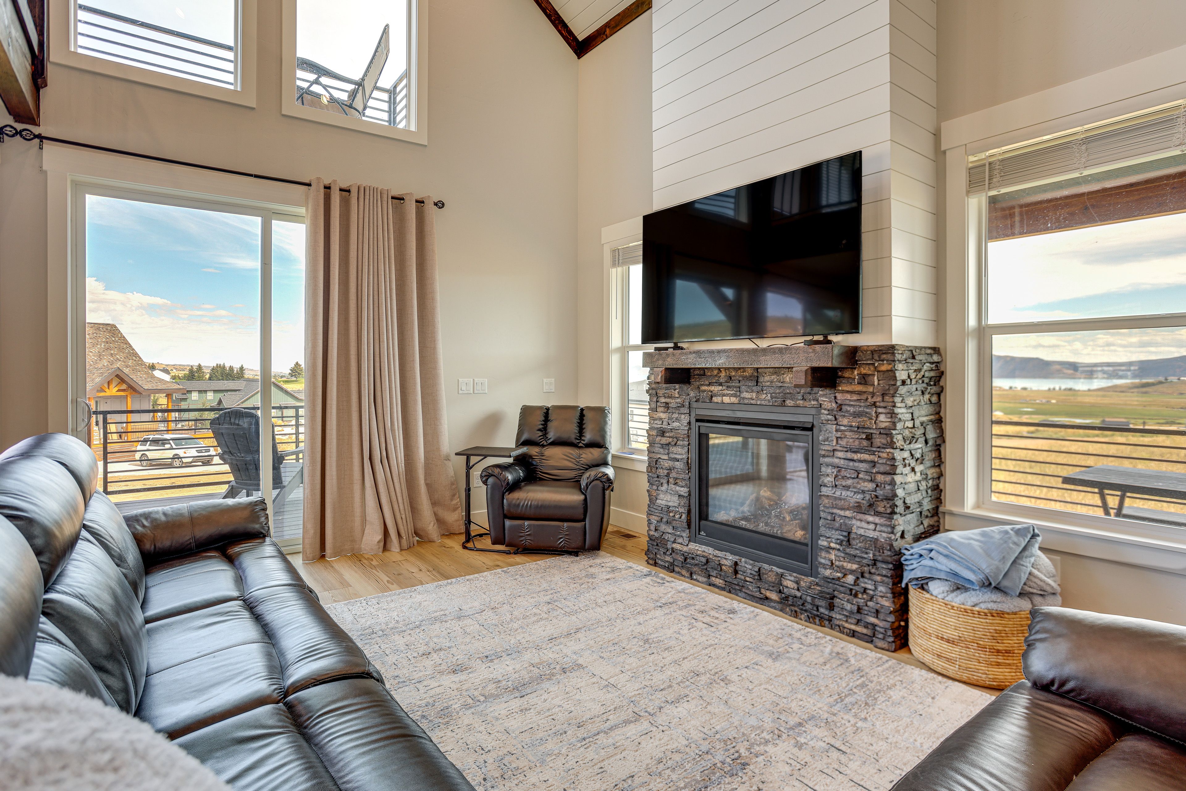 Living Room | 1st Floor | Gas Fireplace | Mountain & Lake Views