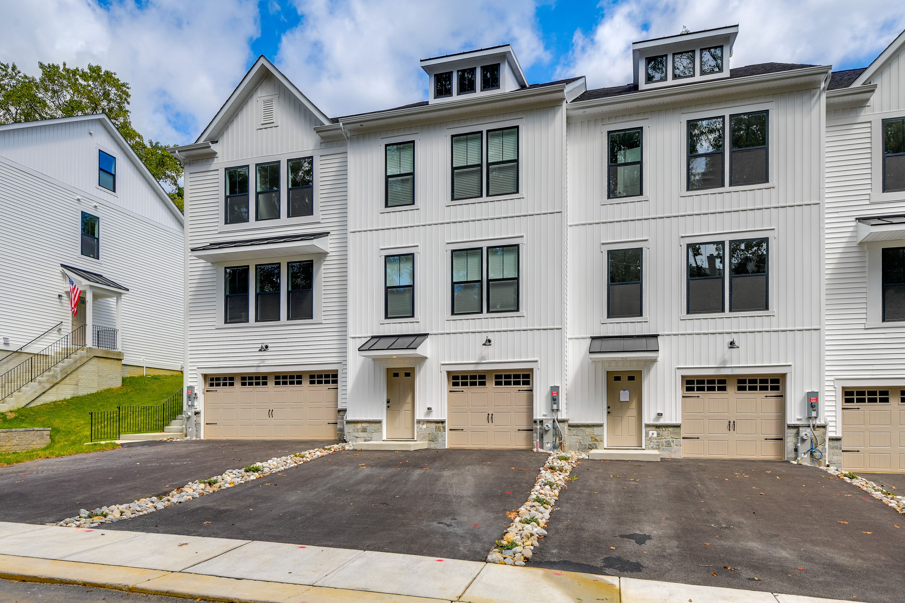 Exterior | Driveway (4 Vehicles) | Free Street Parking | EV Outlet Available