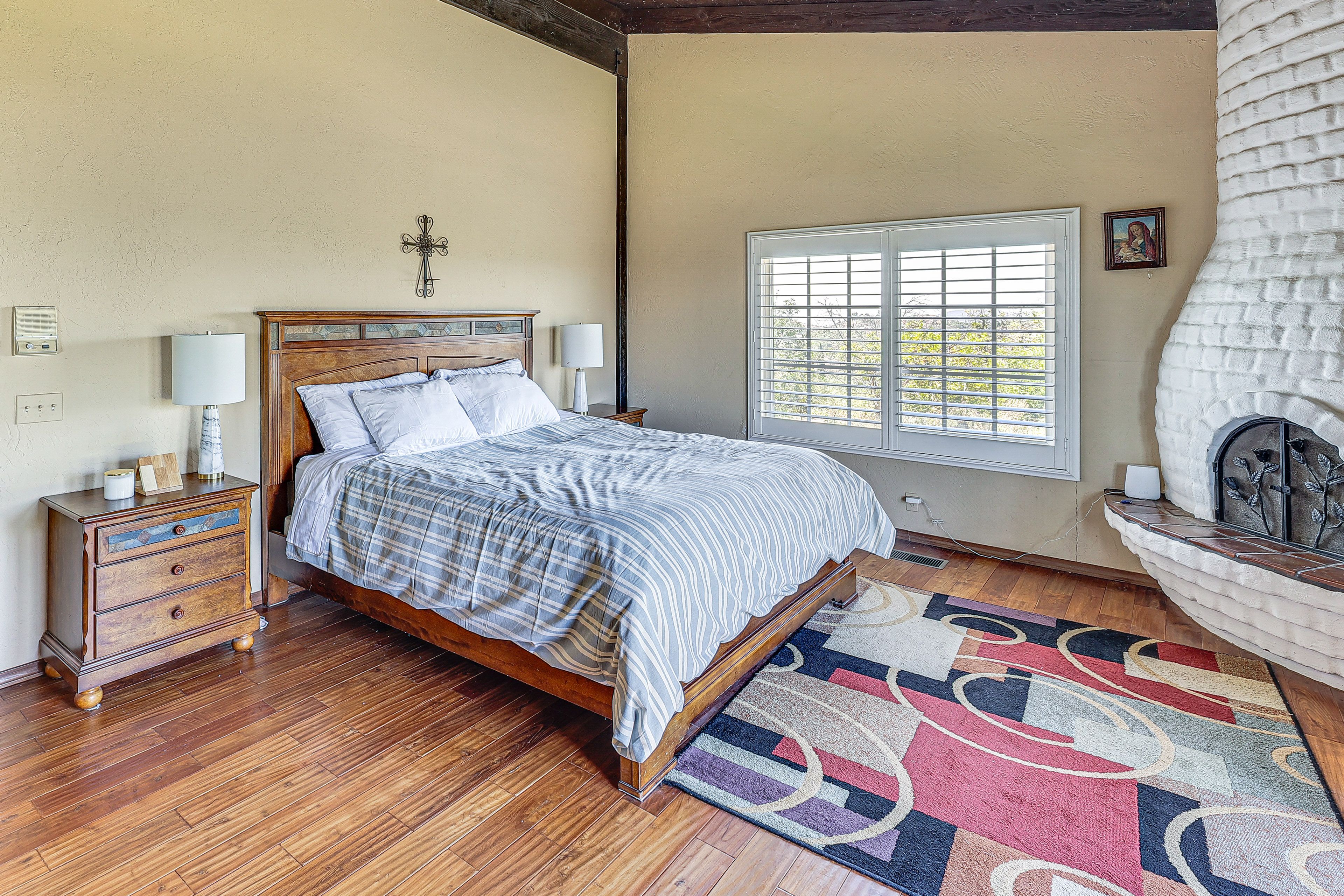 Bedroom 1 | King Bed | Linens Provided | Fireplace | Patio Access