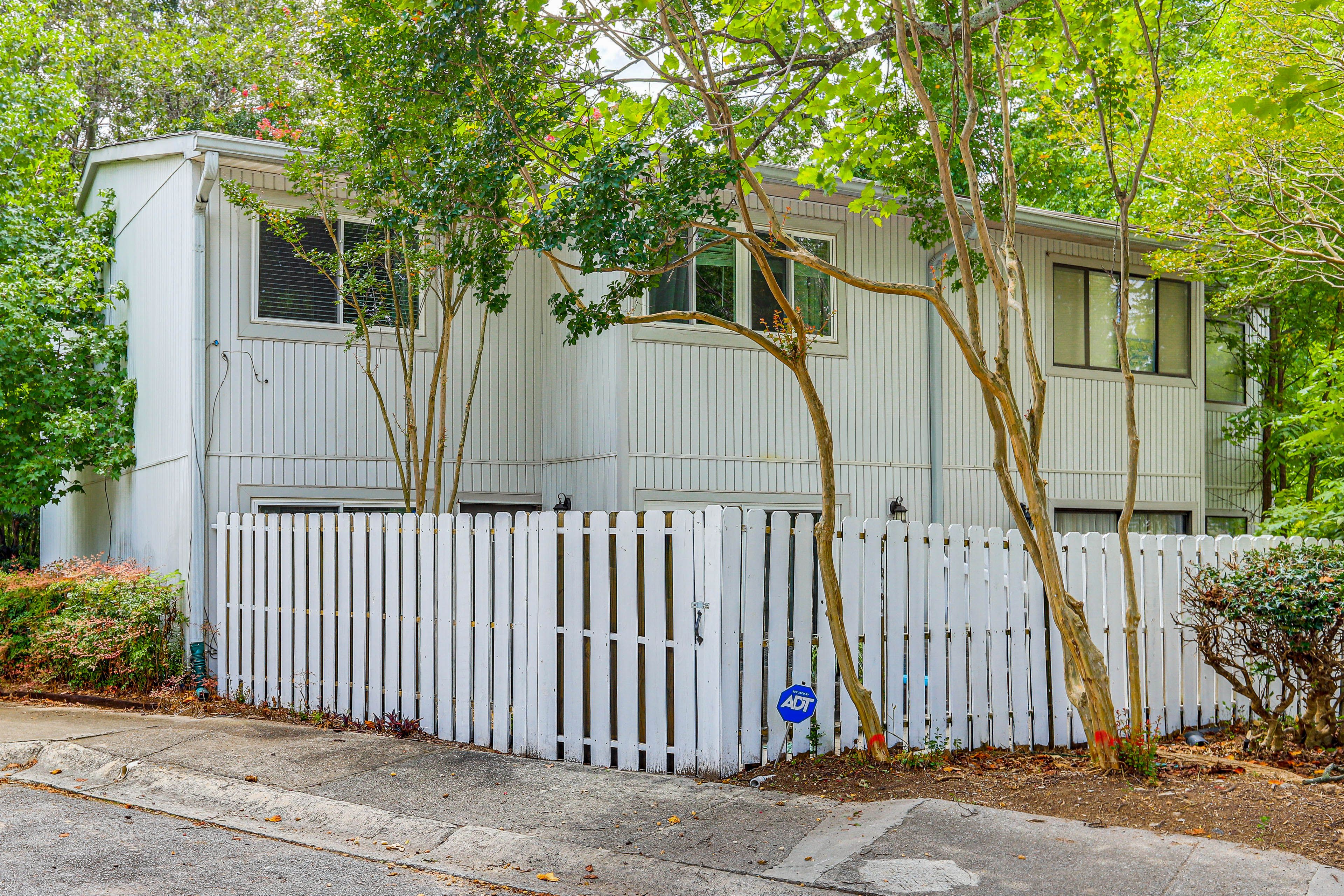 Property Exterior | 2-Story Condo | Fenced-In Patio