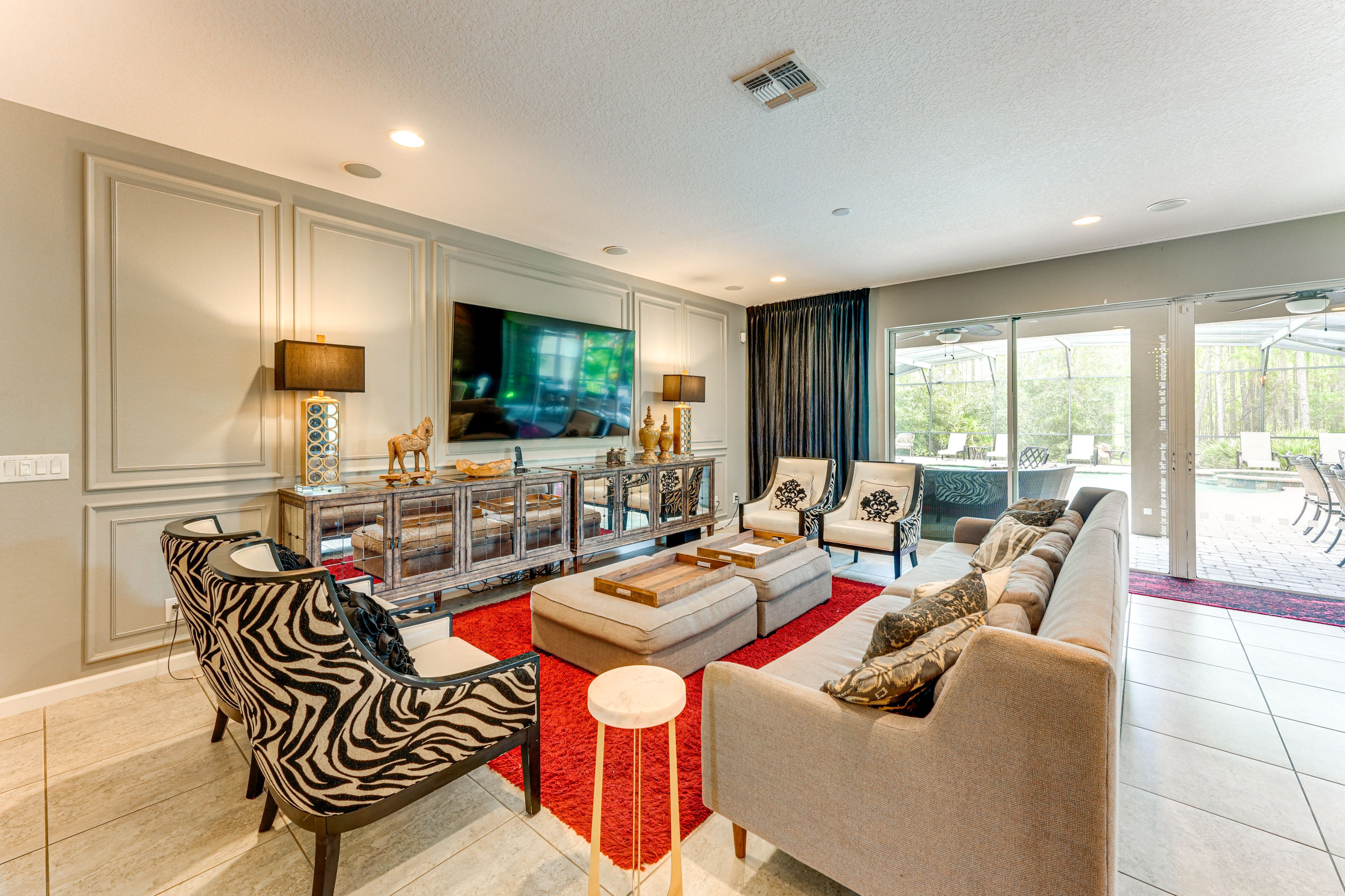 Living Room | 80" TV w/ In-Ceiling Surround Sound | 1st Floor