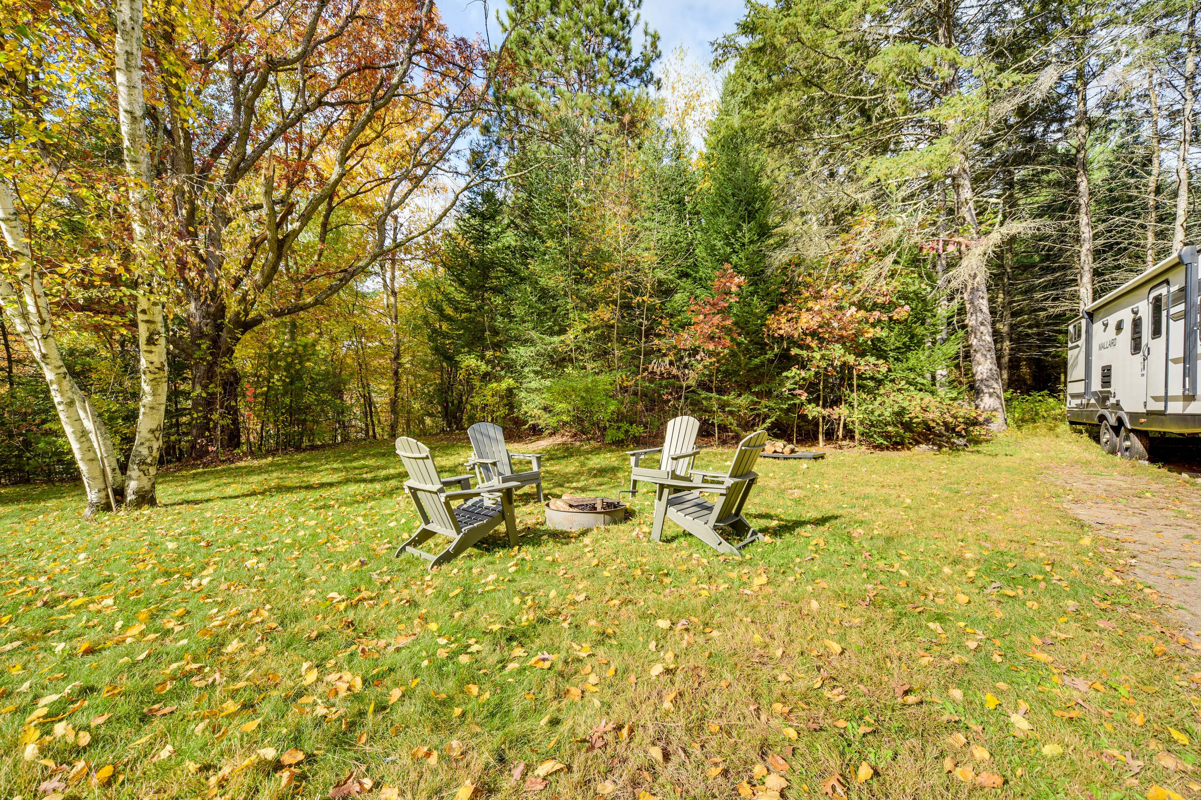 Cabin Exterior | Wood-Burning Fire Pit | Spacious Yard