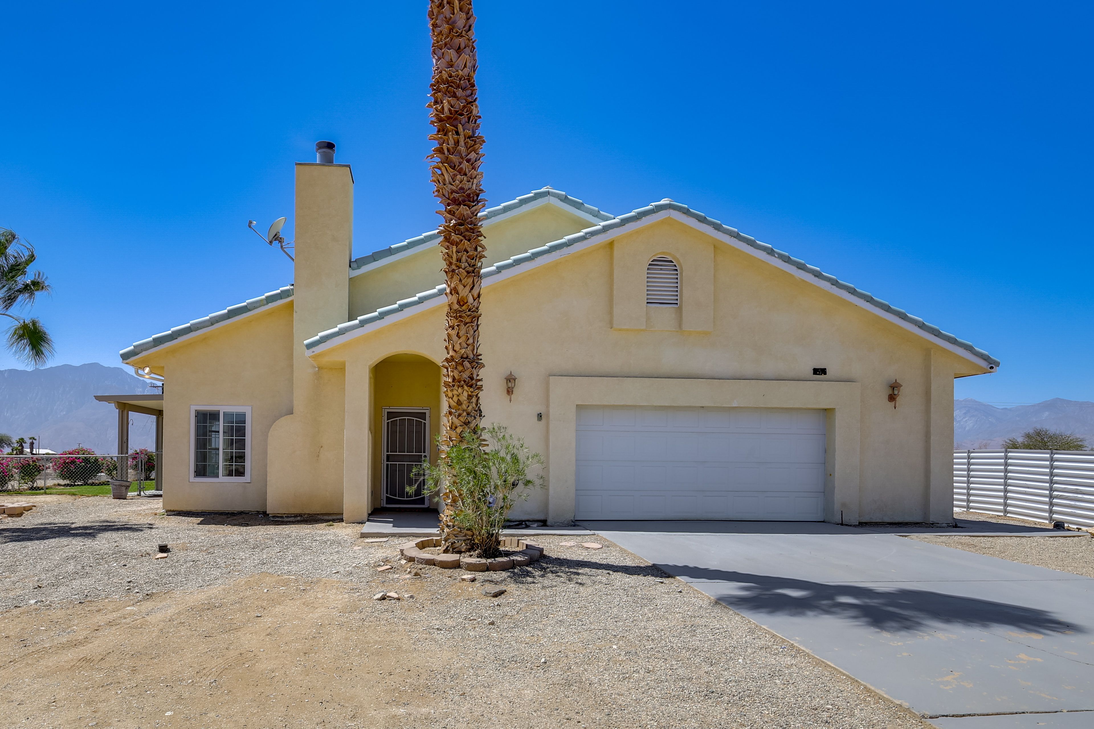 House Exterior | Driveway (2 Vehicles) | Dirt Parking Area (2 Vehicles)
