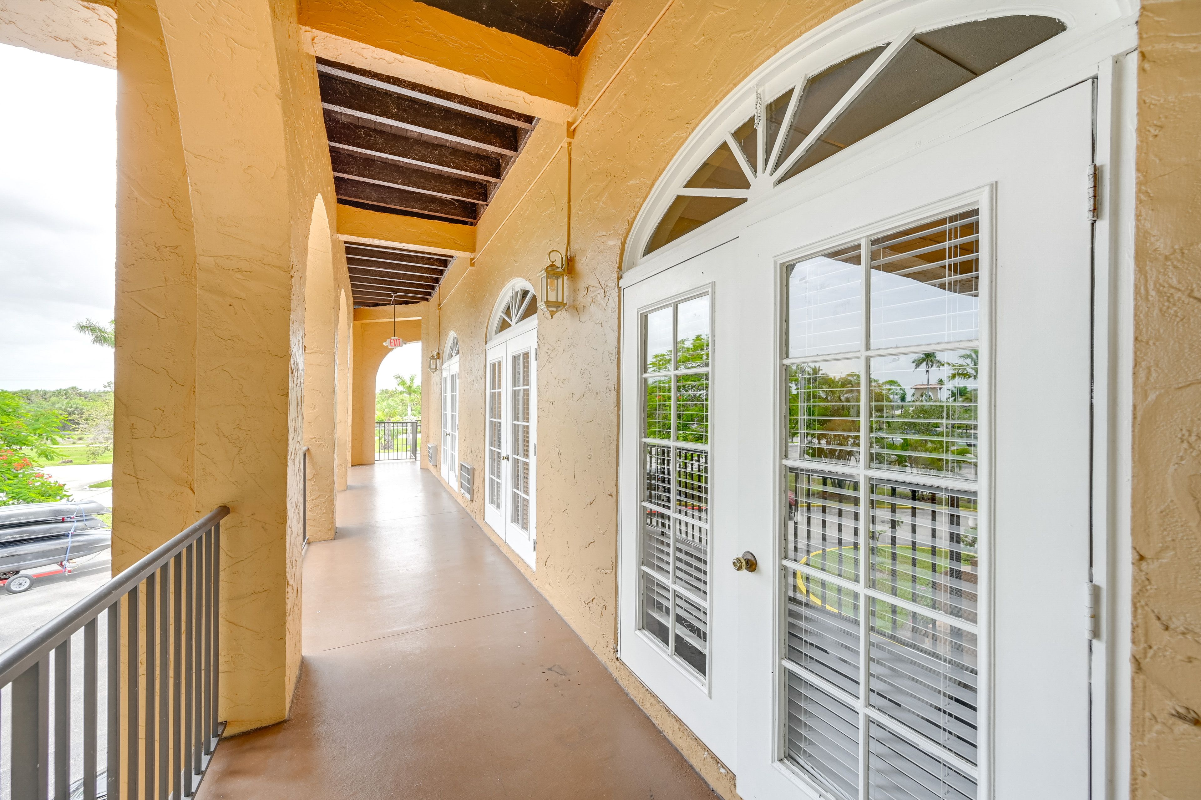 Unit Exterior | Shared Balcony Space | Single-Story Condo