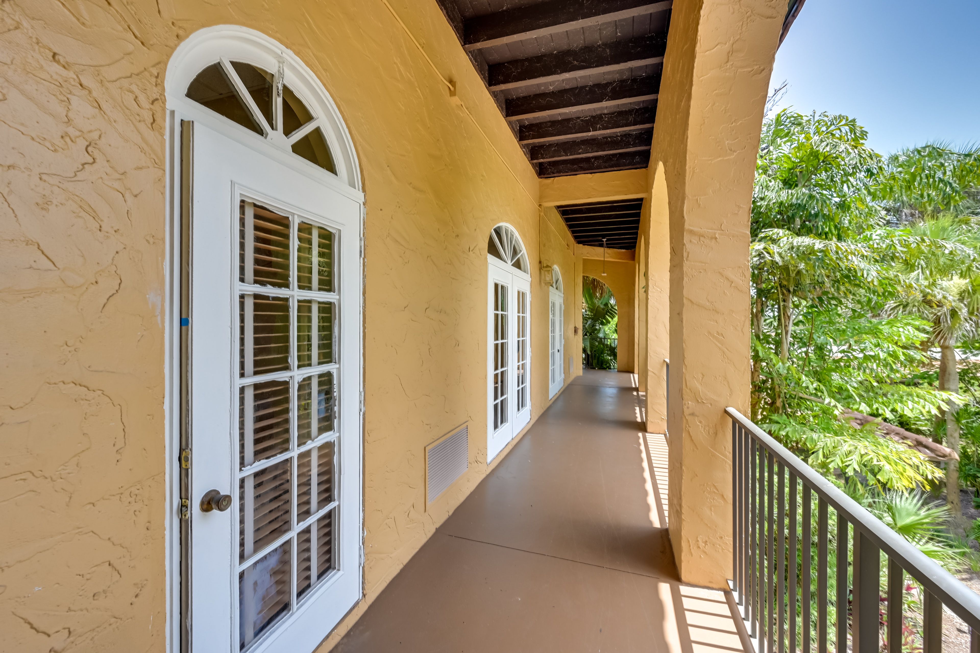Unit Exterior | Shared Balcony Space | Single-Story Condo