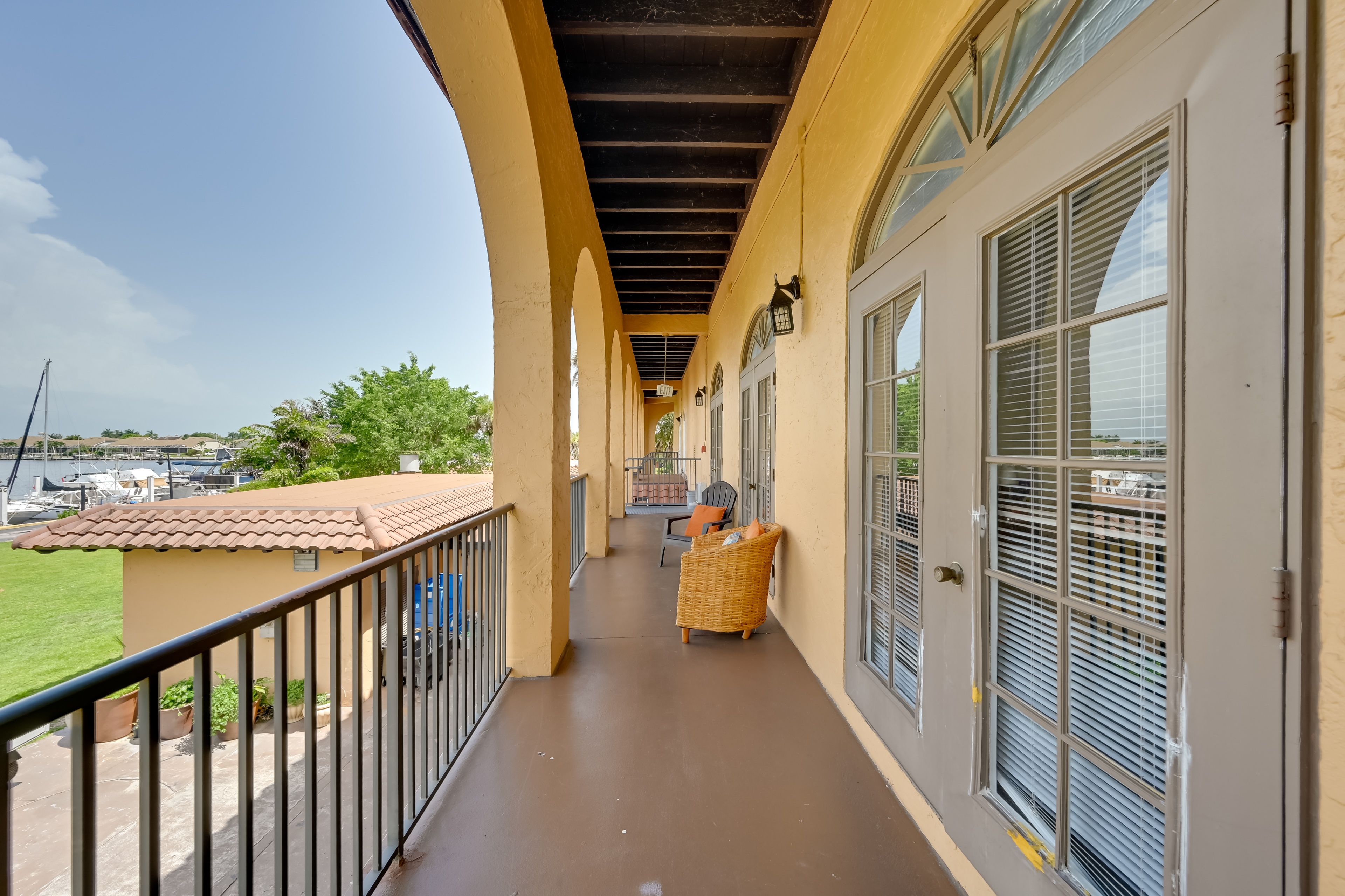 Unit Exterior | Shared Balcony Space | Single-Story Condo