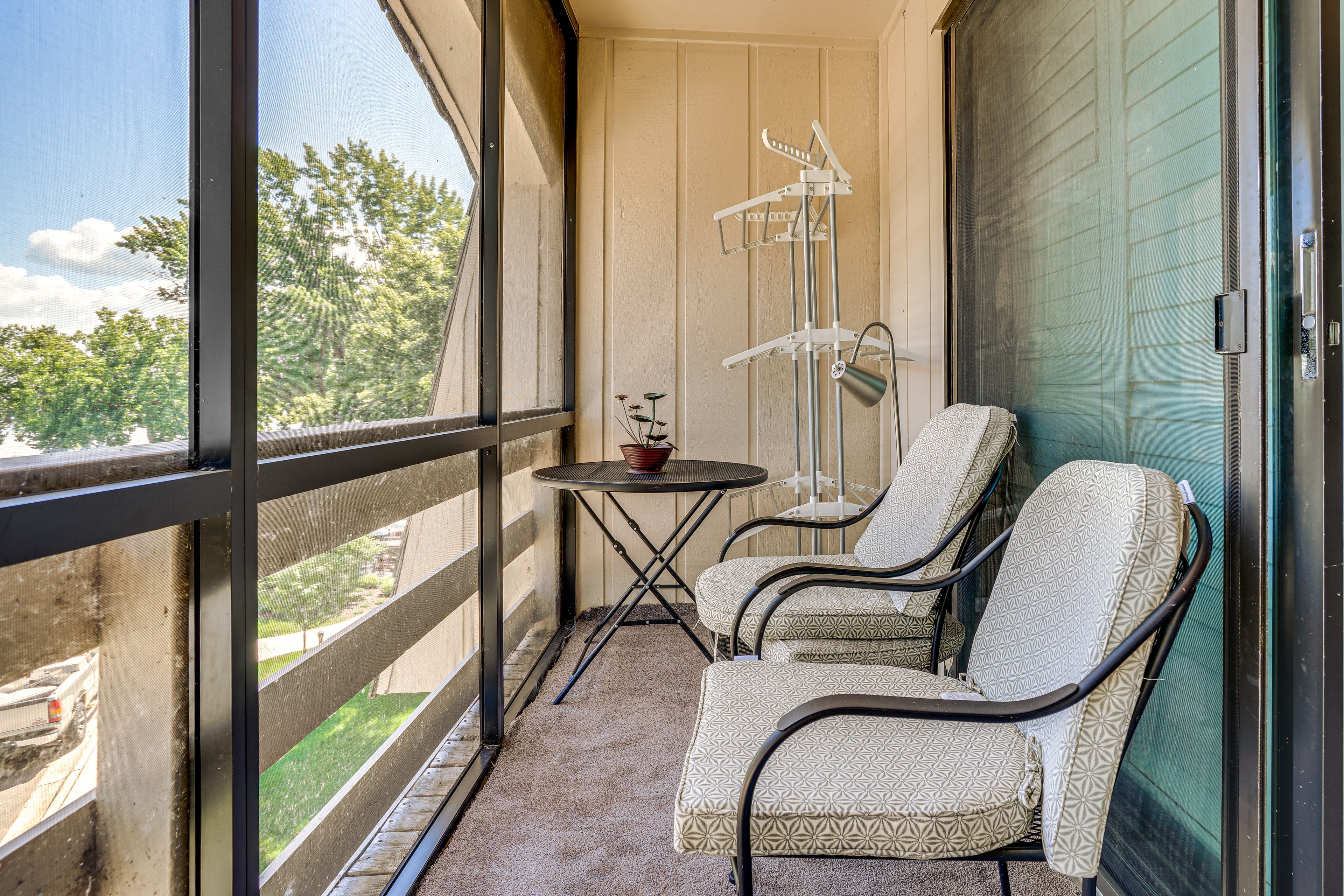 Property Exterior | Screened-In Balcony | Single-Story Condo