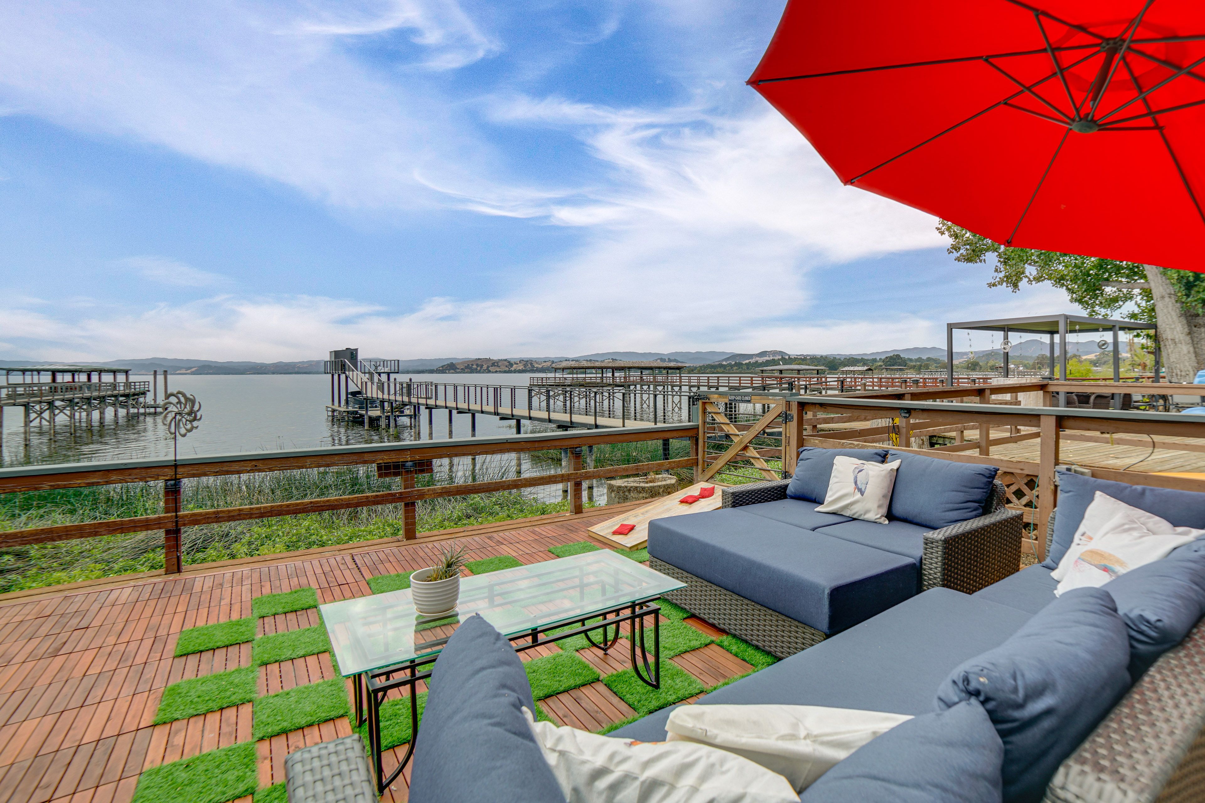 Furnished Deck | Lounge & Dining Areas | Cornhole | Lake Access