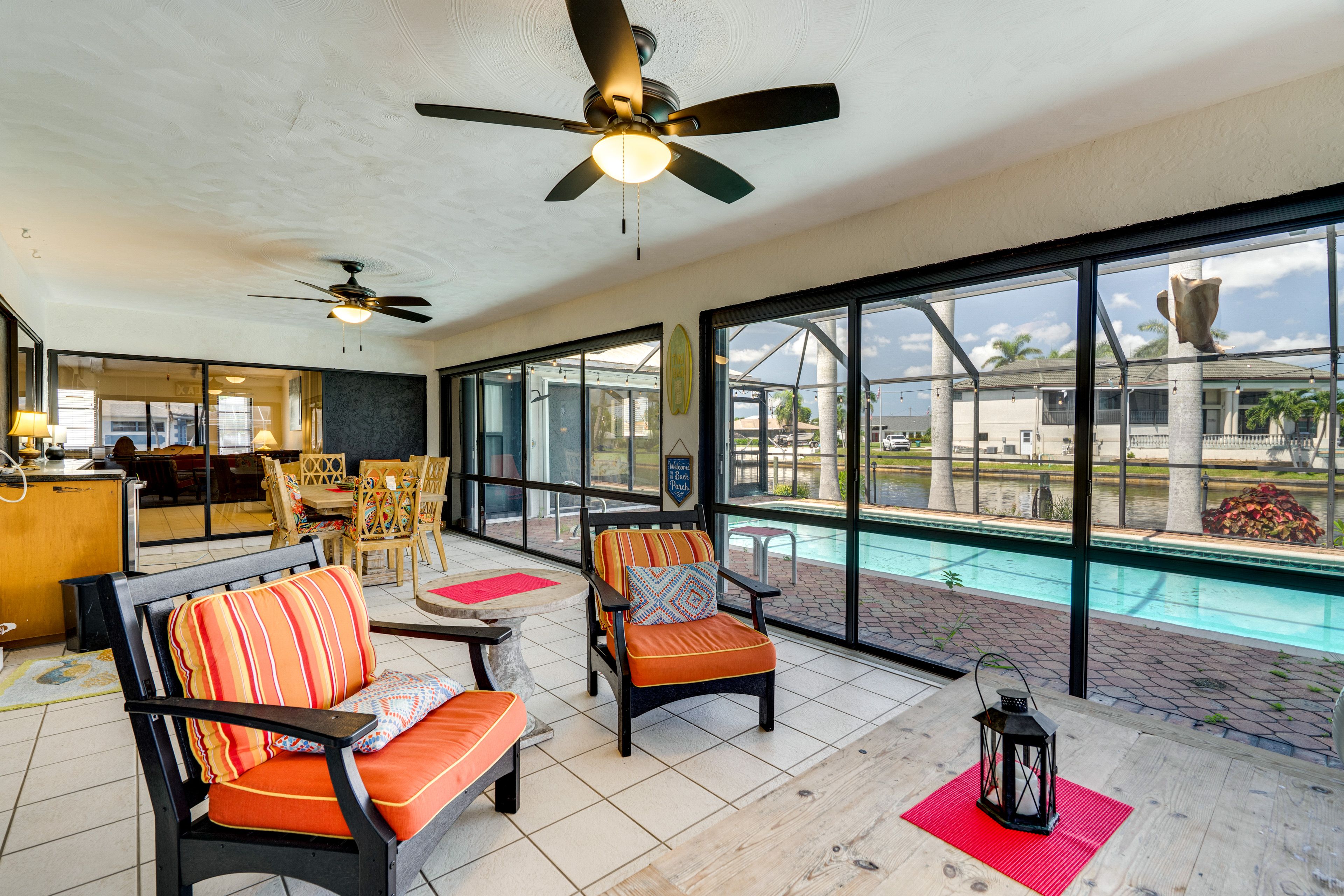 Florida Room | Outdoor Dining Area | Mini Fridge | Lounge Seating | Free WiFi