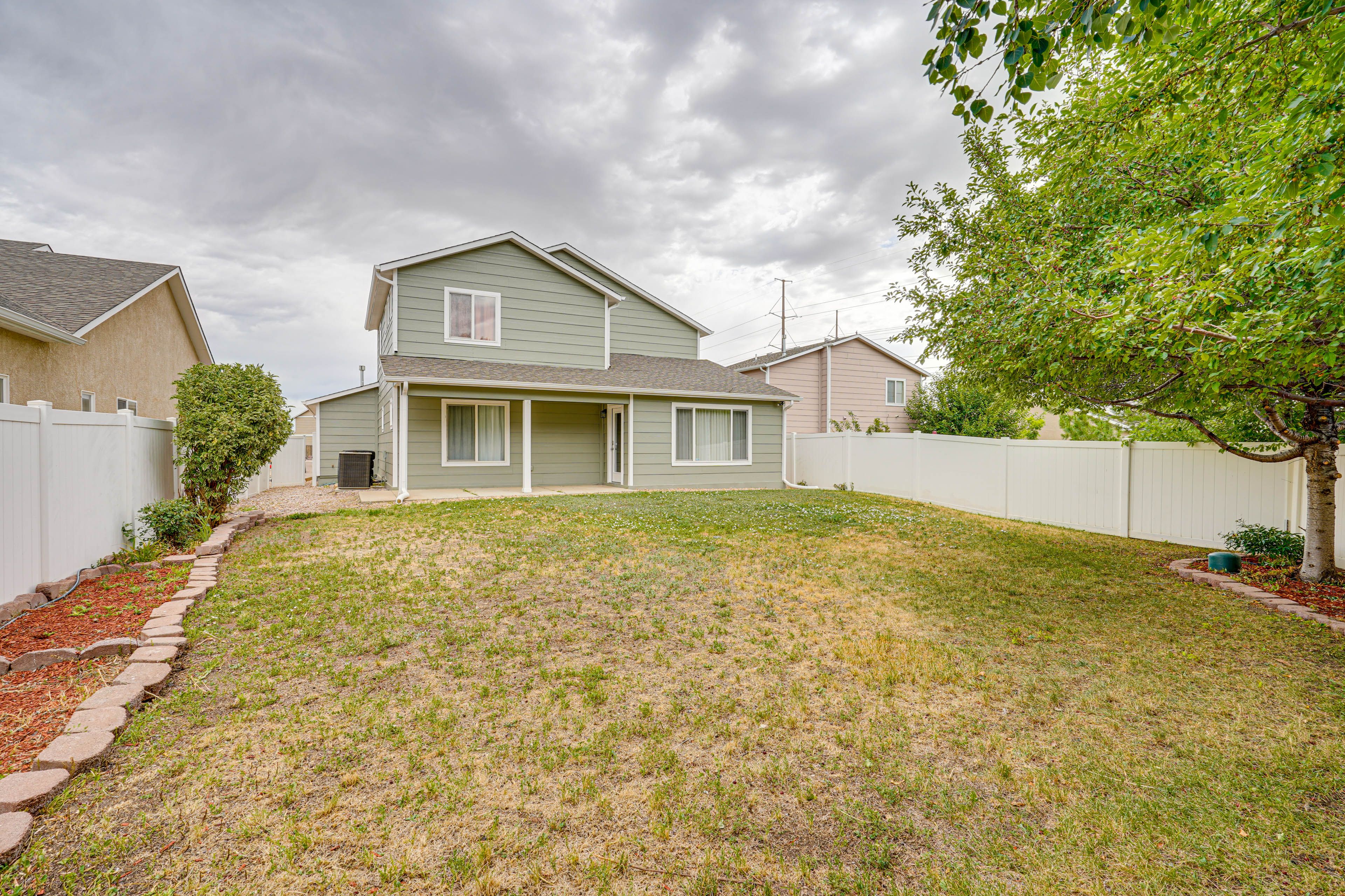 Pueblo Vacation Rental | 3BR | 2.5BA | 2,042 Sq Ft | Half Step Required