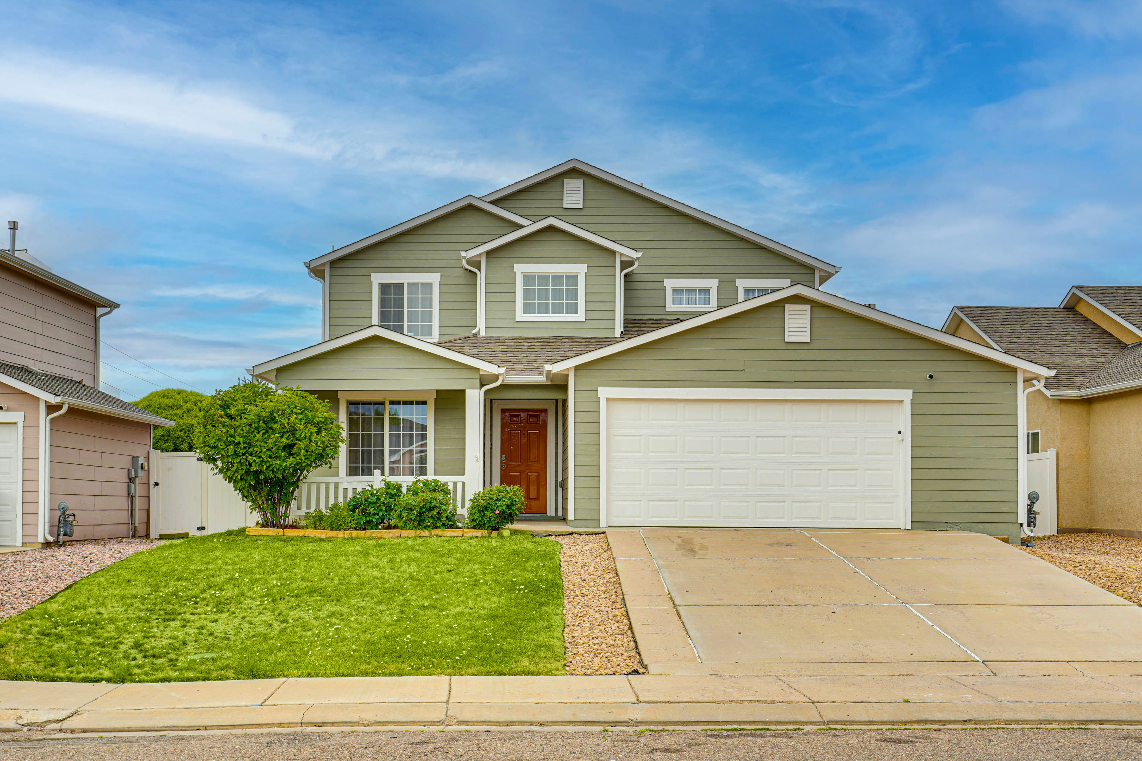 Property Exterior | Fenced-In Yard | Covered Patio