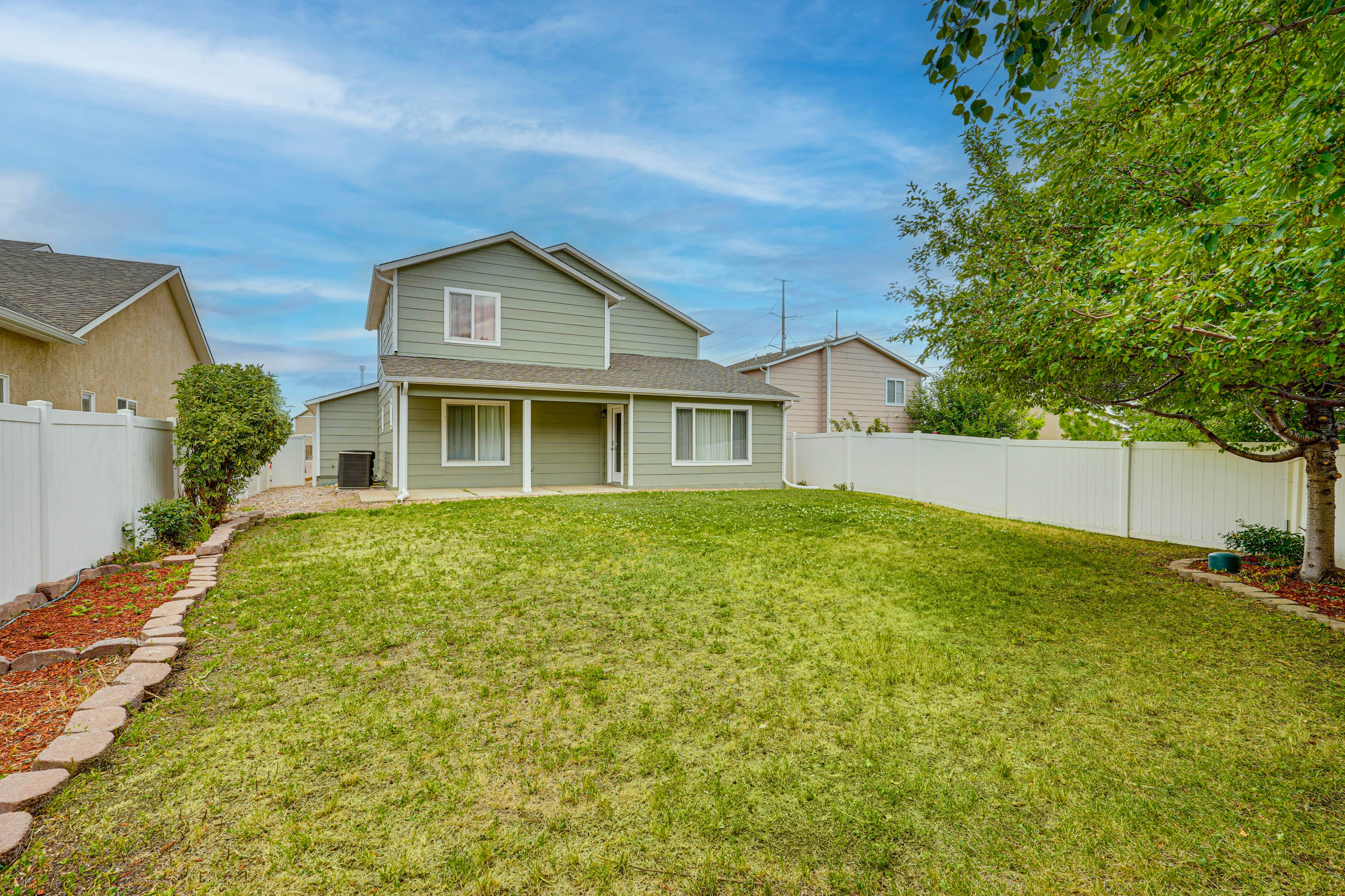 Pueblo Vacation Rental | 3BR | 2.5BA | 2,042 Sq Ft | Half Step Required