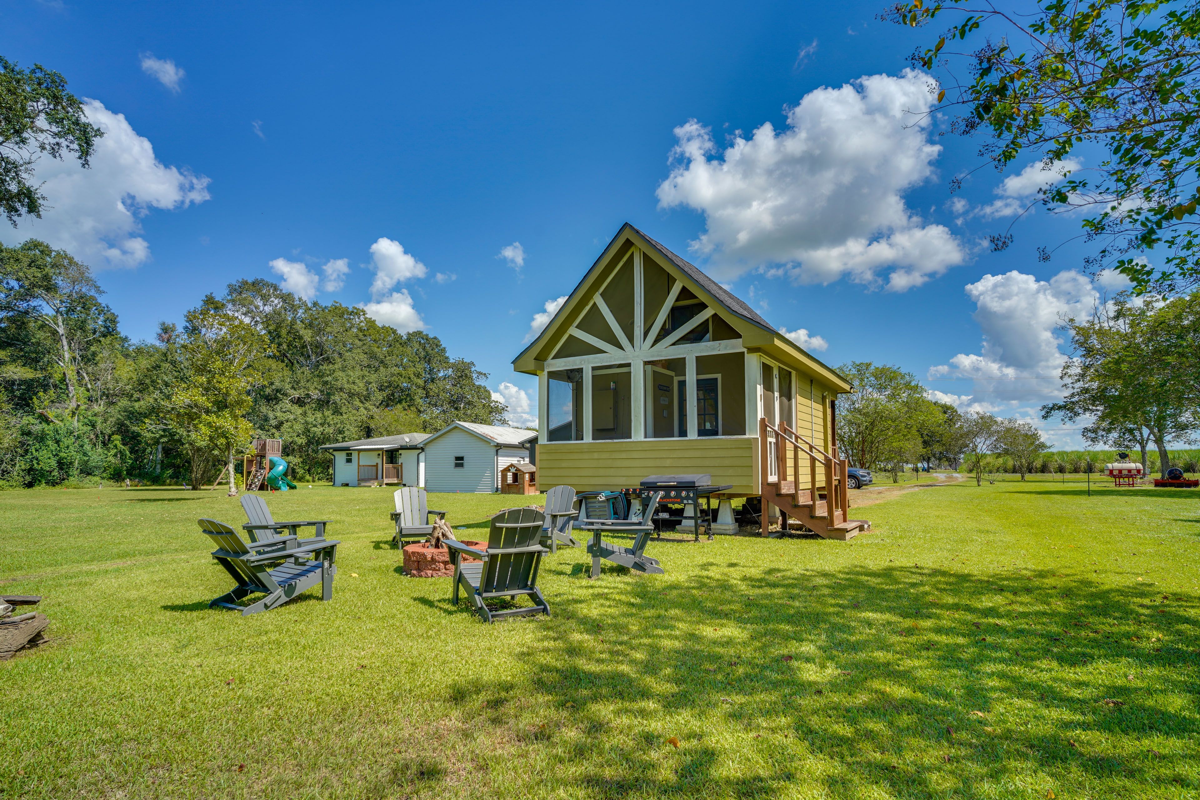 Studio Exterior | Fire Pit | Spacious Yard | Water Views