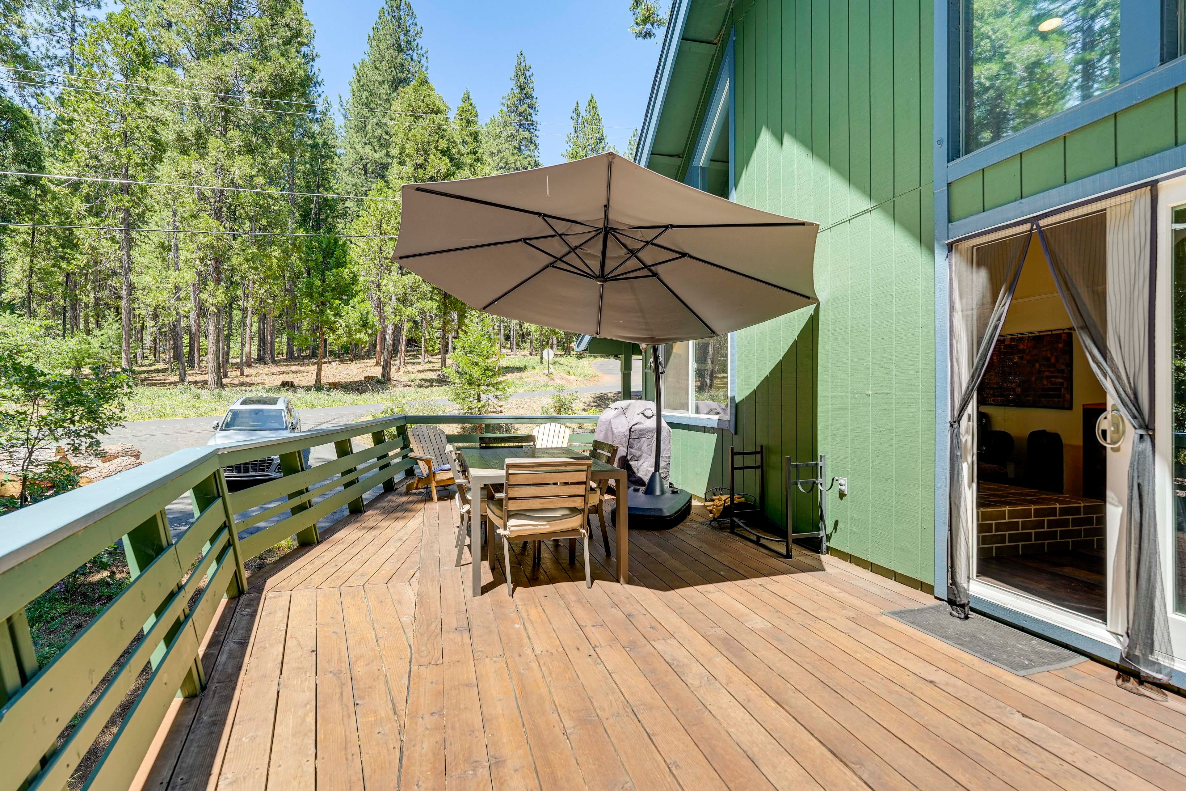House Exterior | Wraparound Deck | Dining Area | Gas Grill