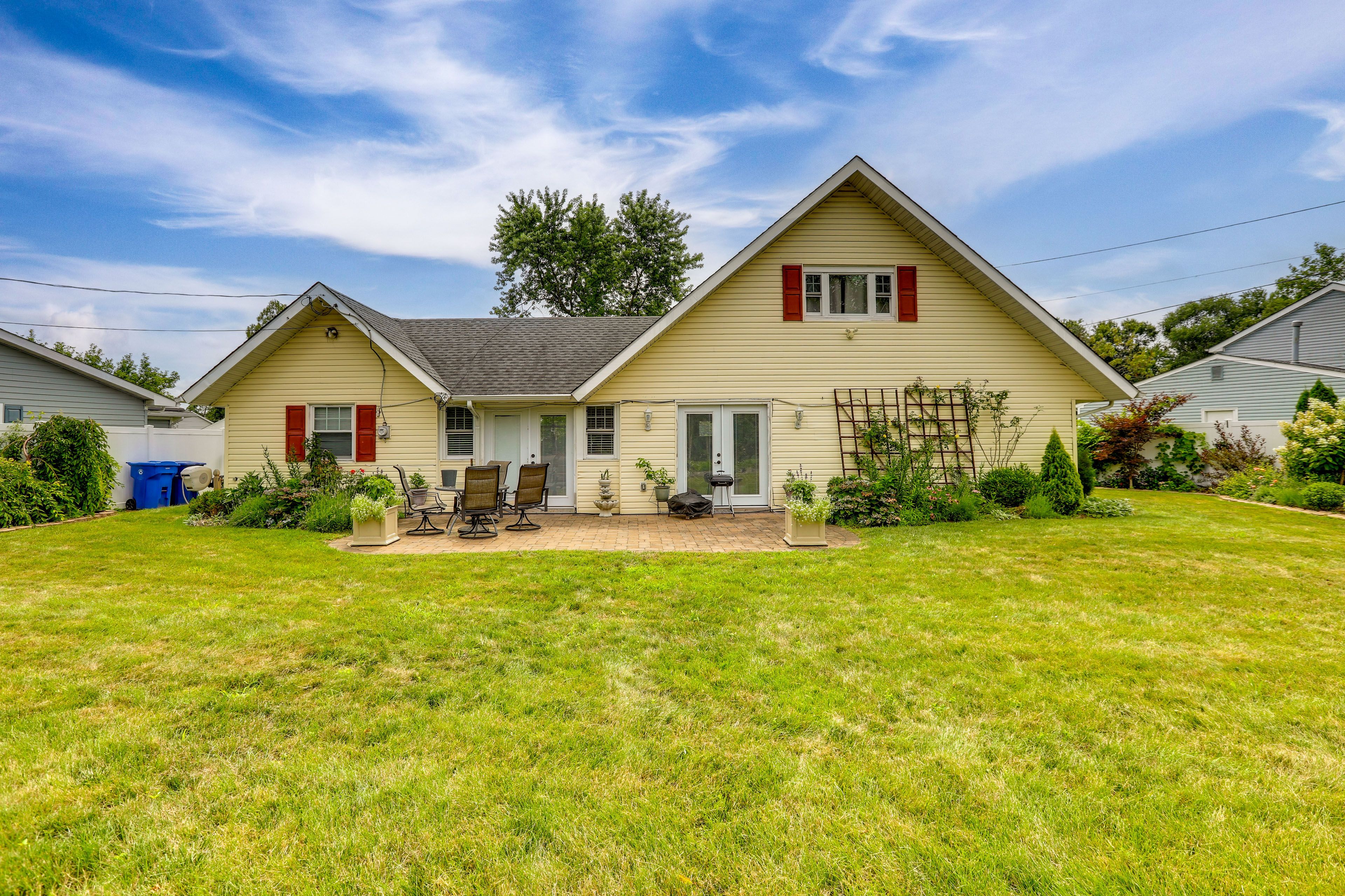 Property Exterior | Single-Level Home | Furnished Patio w/ Charcoal Grill