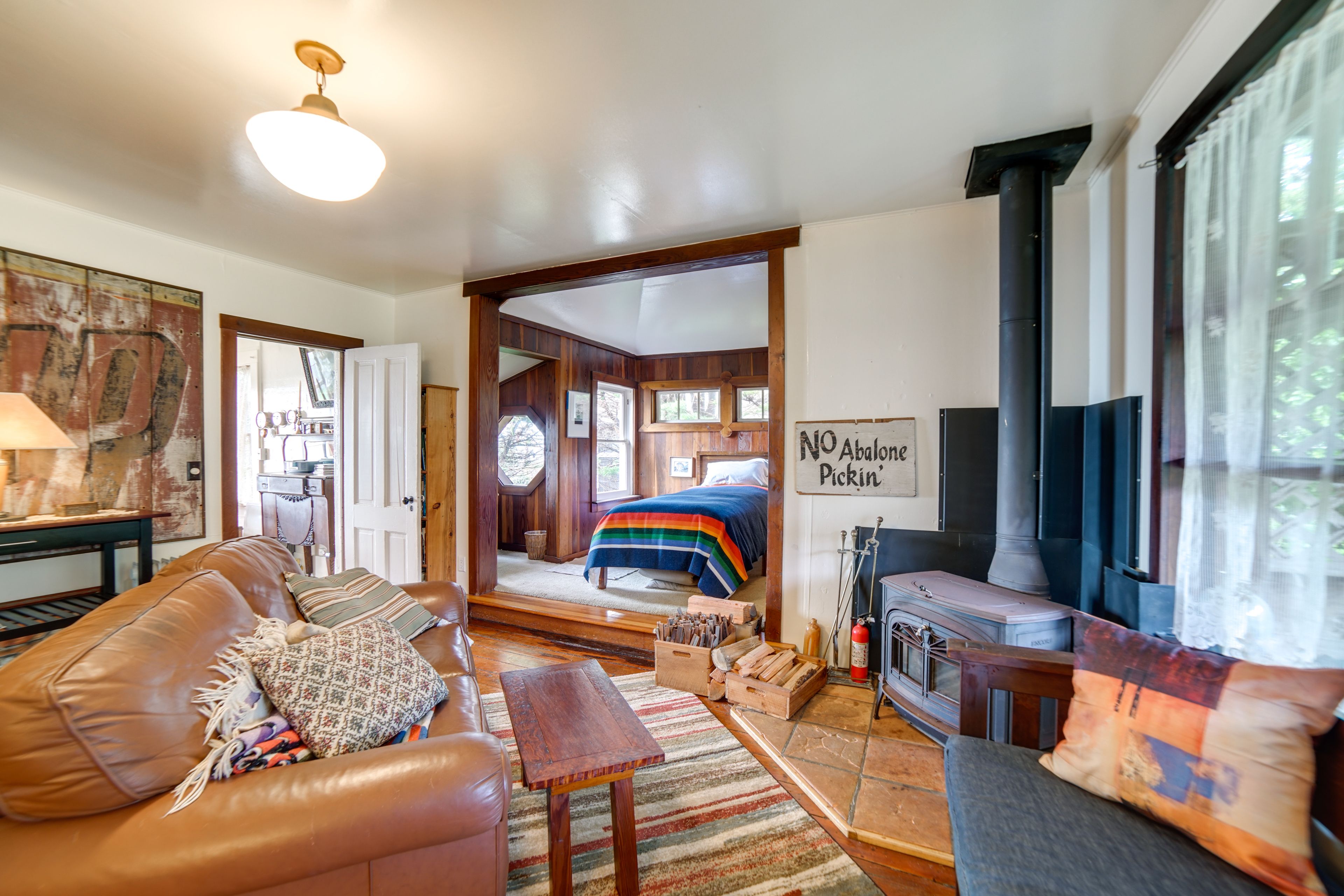 Living Room | Wood-Burning Stove | Twin Bed | 1st Floor