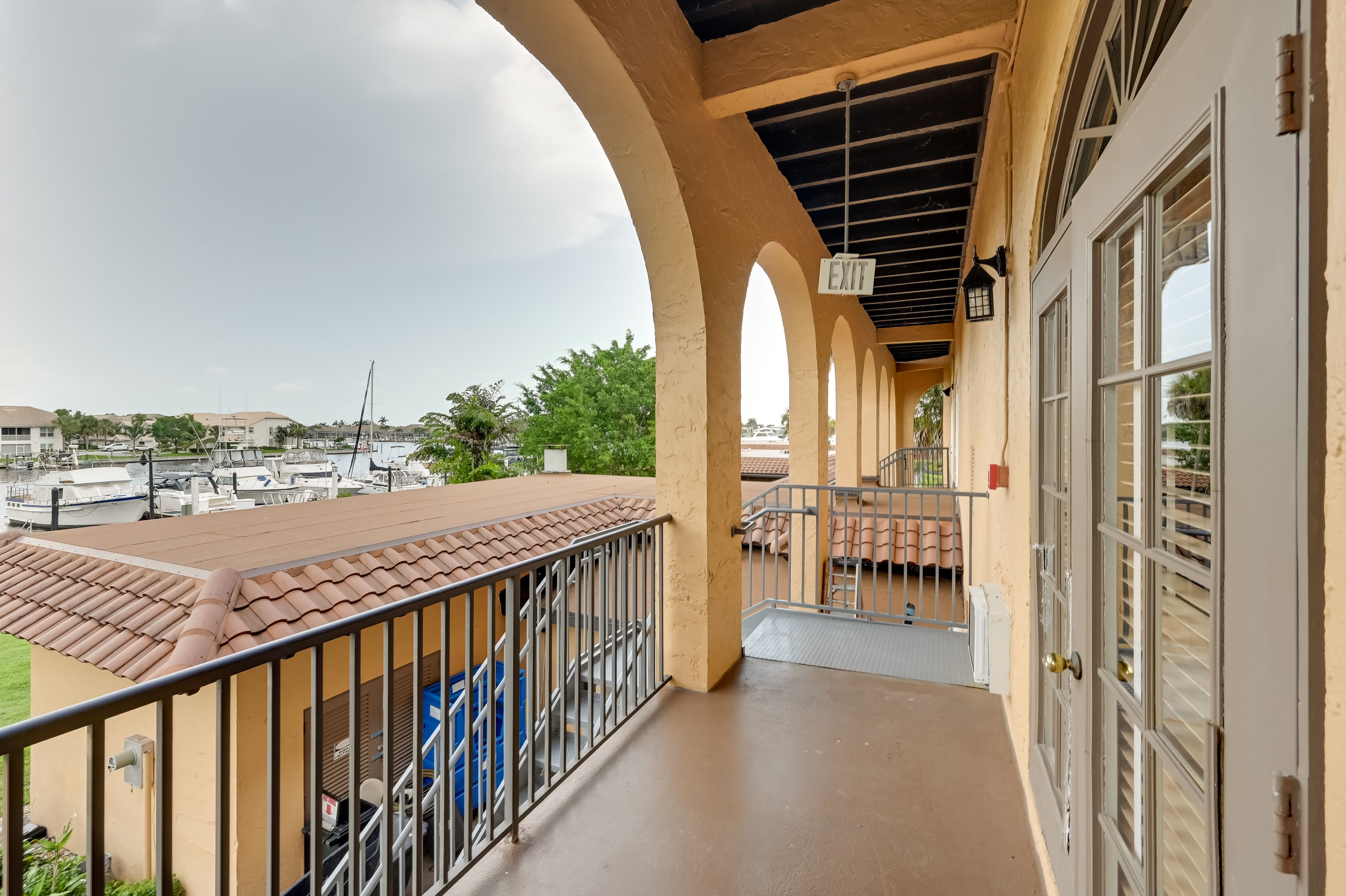Unit Exterior | Shared Balcony Space | Single-Story Condo