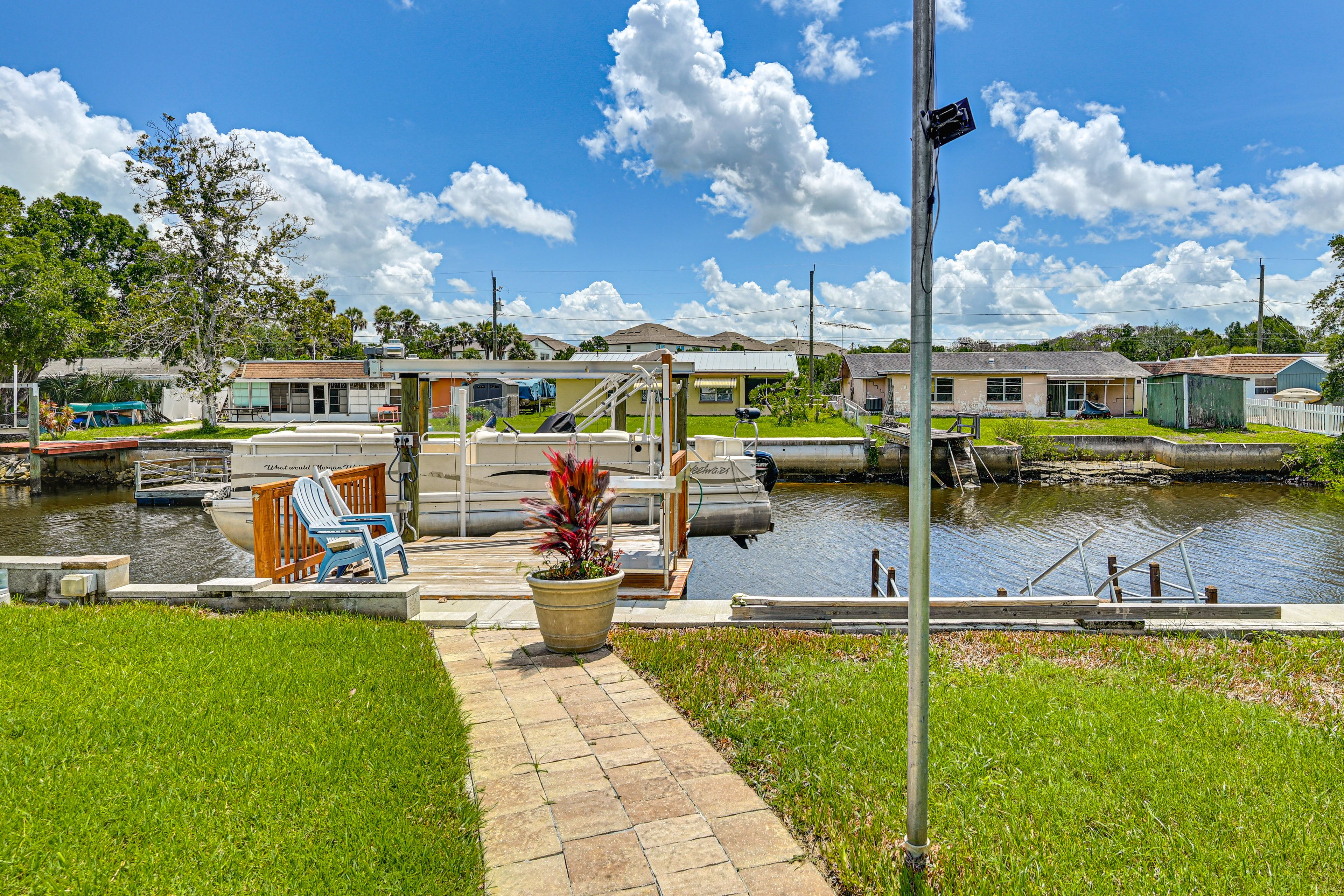 Backyard | Canal Access | Kayaks | Boat Dock