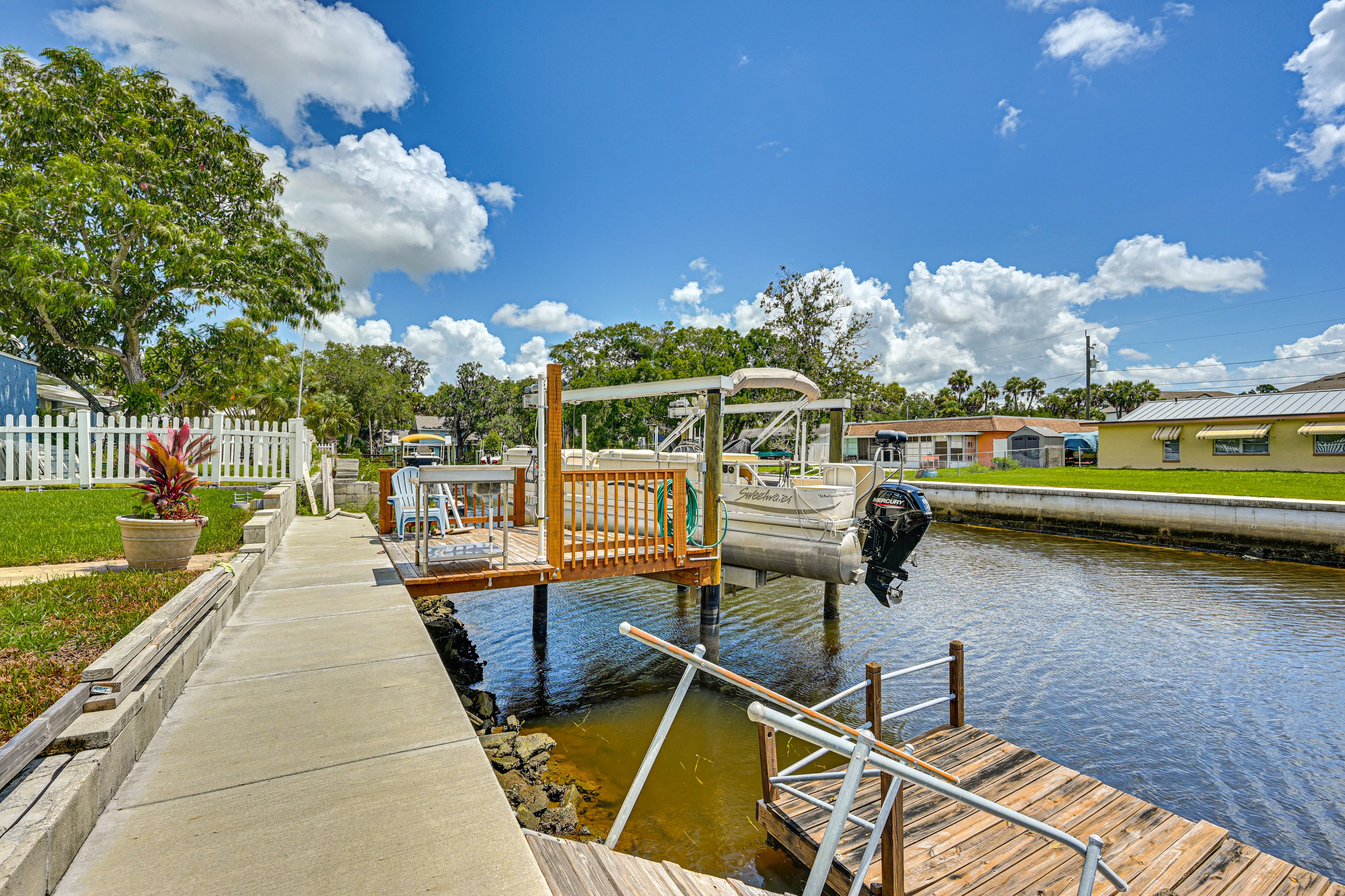Port Richey Vacation Rental | 2BR | 1.5BA | 1,300 Sq Ft | 2 Small Steps Required