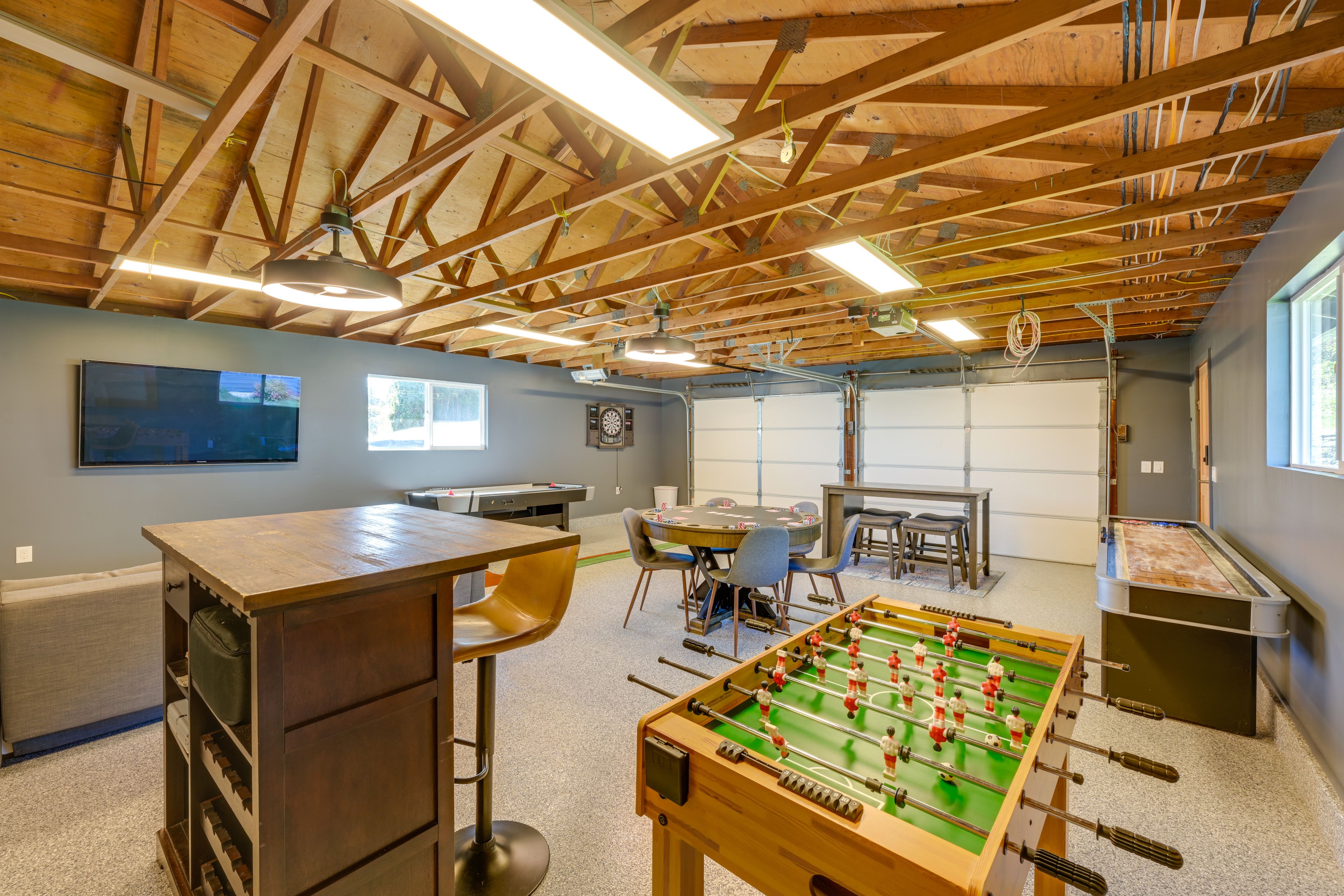 Game Room (Garage) | Shuffleboard Table | Dartboard | Air Hockey Table