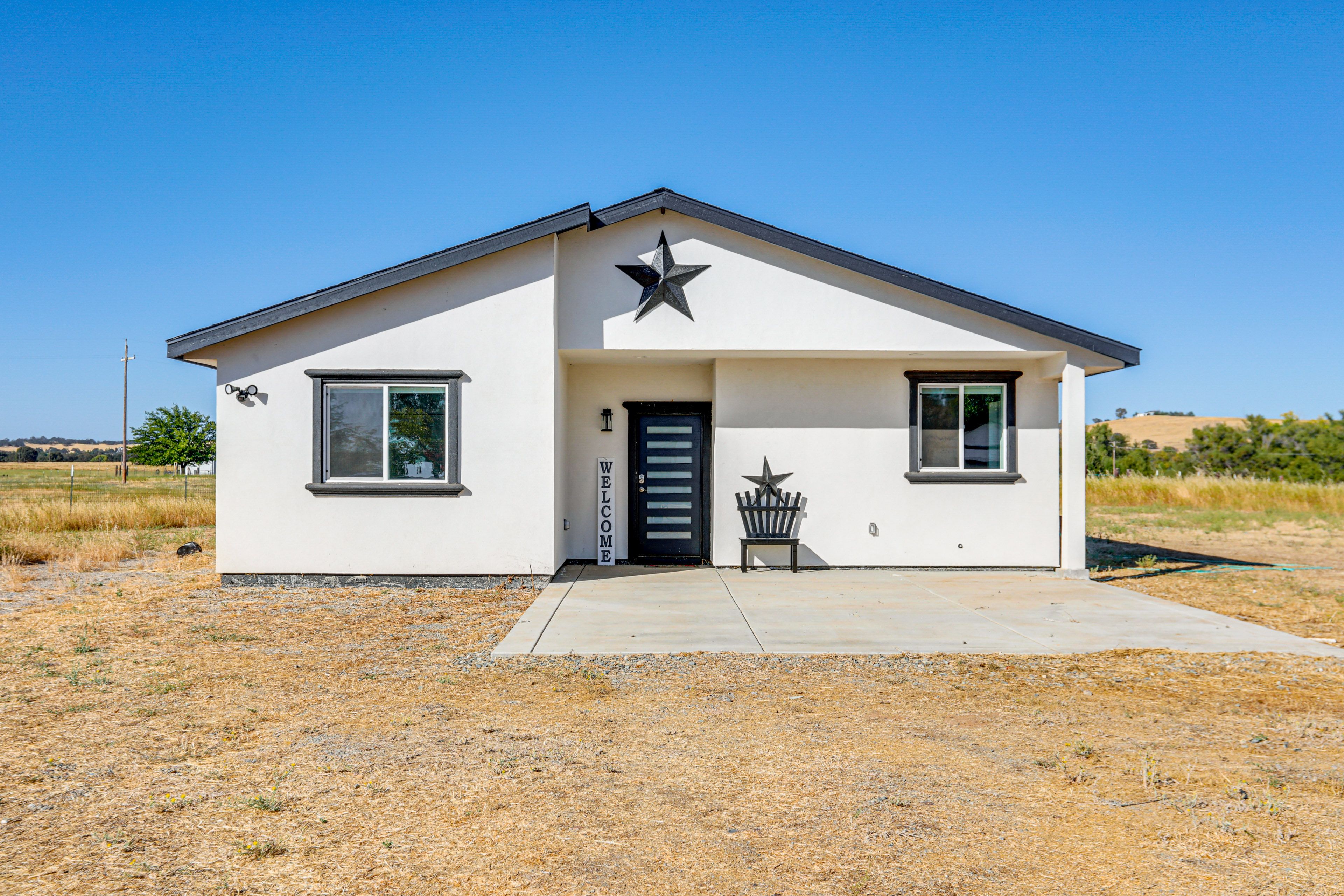 Property Exterior | Private Patio | Fenced-In Yard