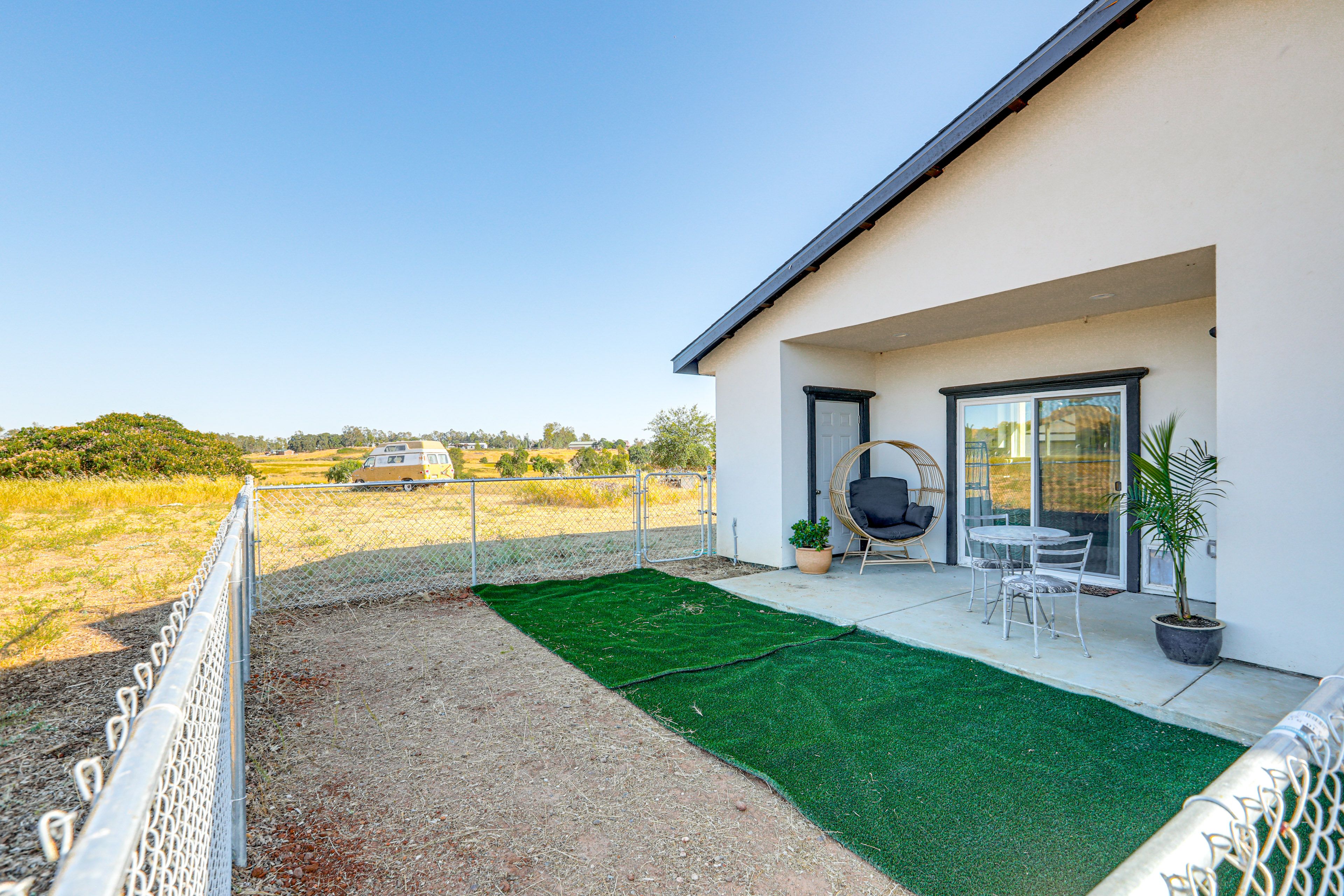 Private Patio | Outdoor Dining Area | Fenced-In Yard