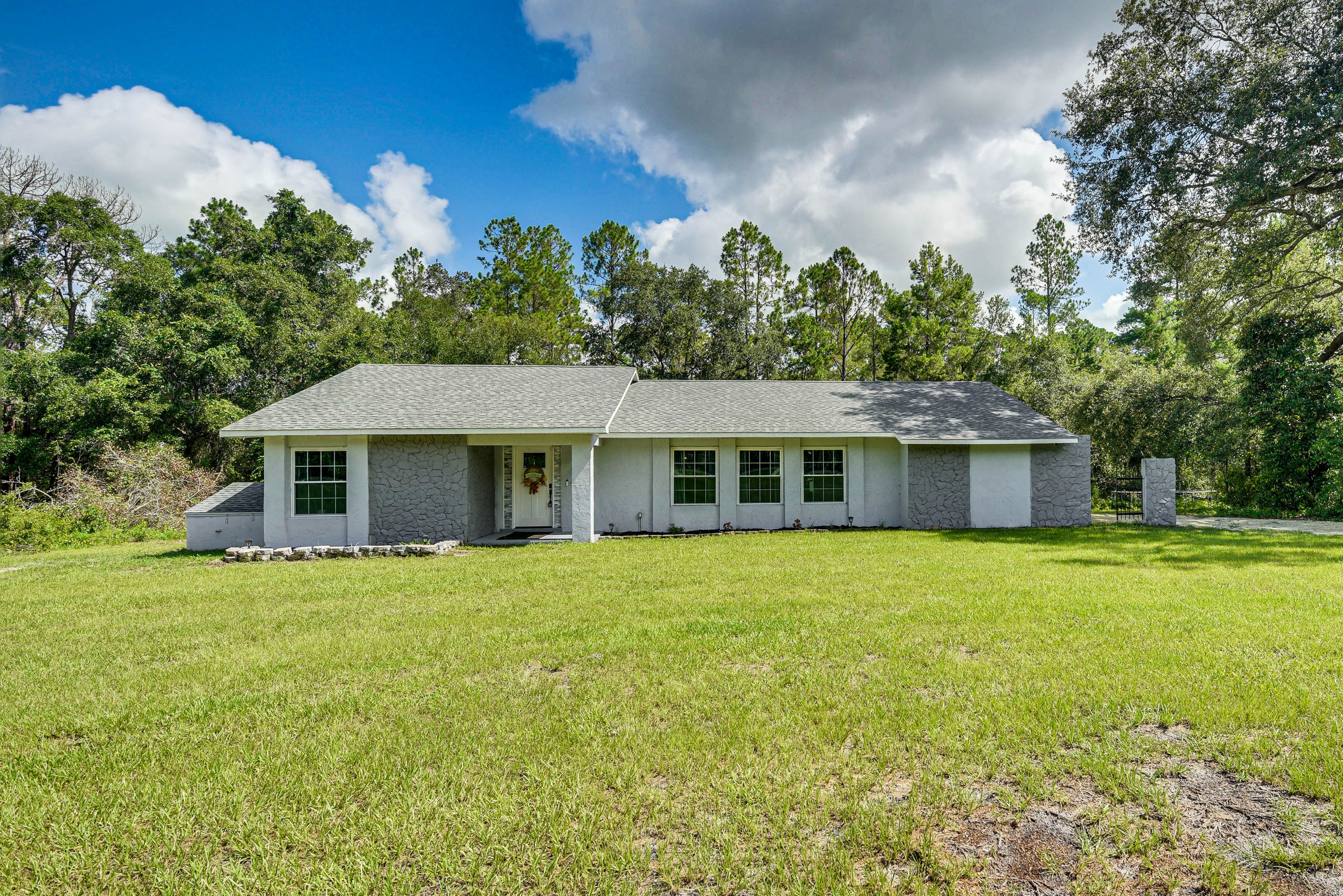 Property Exterior | Single-Story Home | Spacious Private Yard