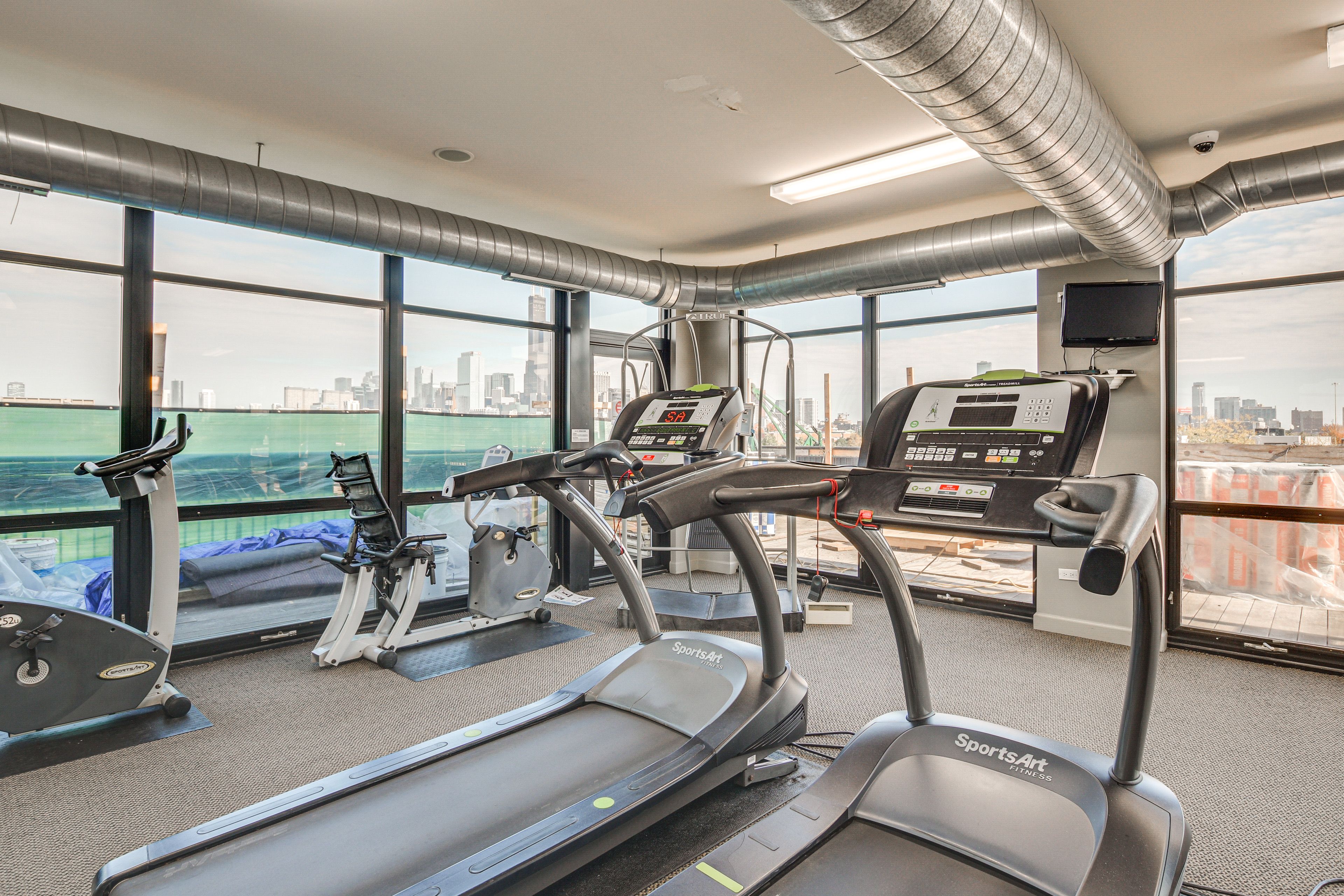 Community Fitness Center | Outdoor Pool | Deck w/ City Views