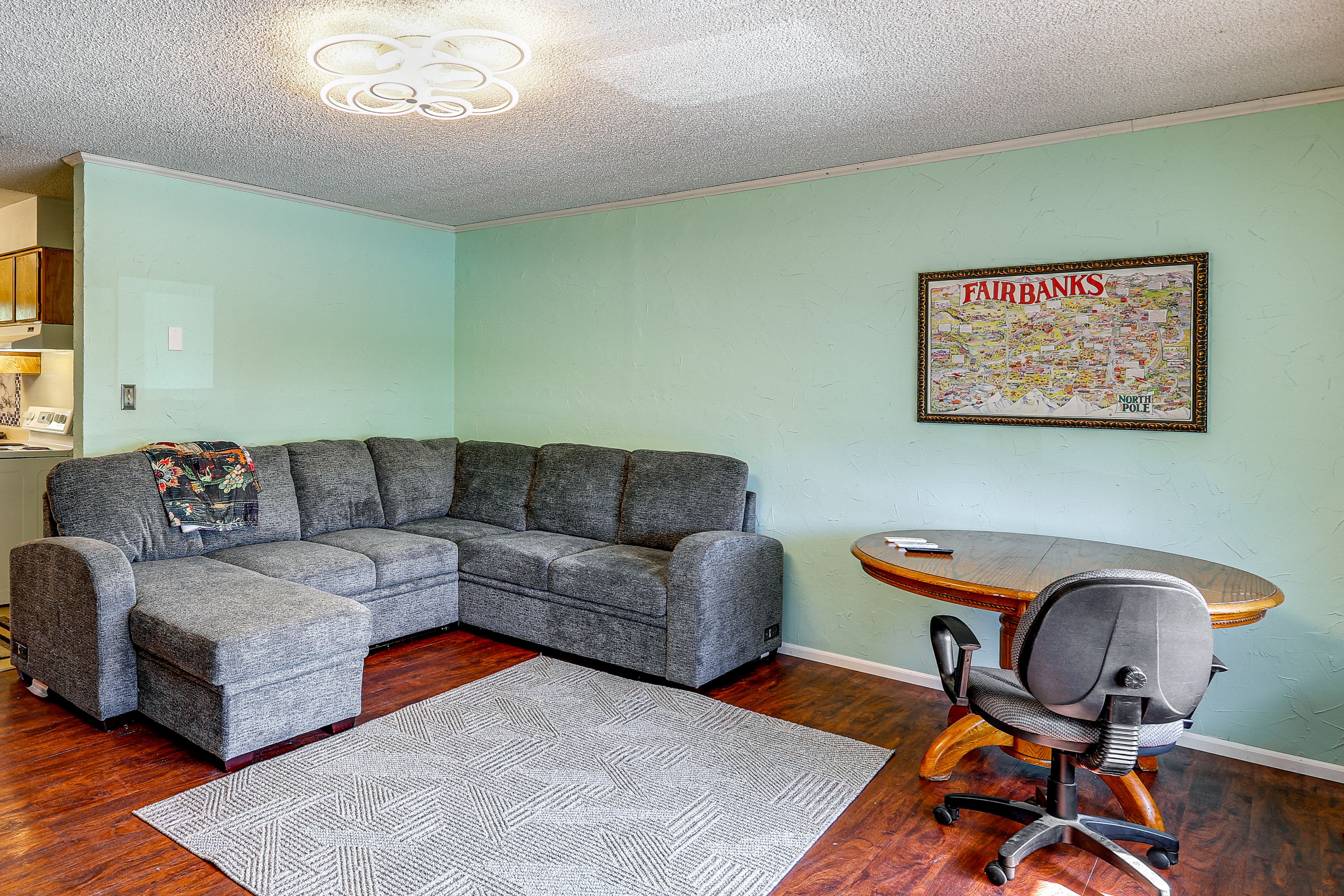 Living Room | Full Sleeper Sofa | Workspace | Standing A/C Unit