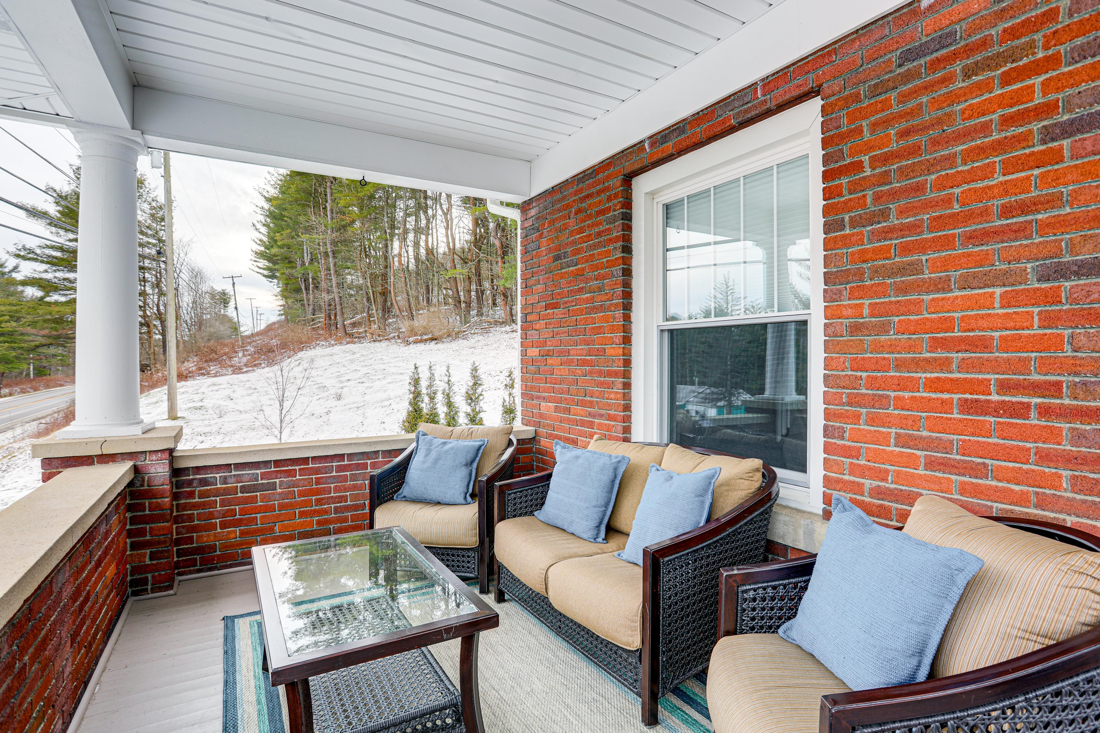Covered Porch | Outdoor Seating | Spacious Yard