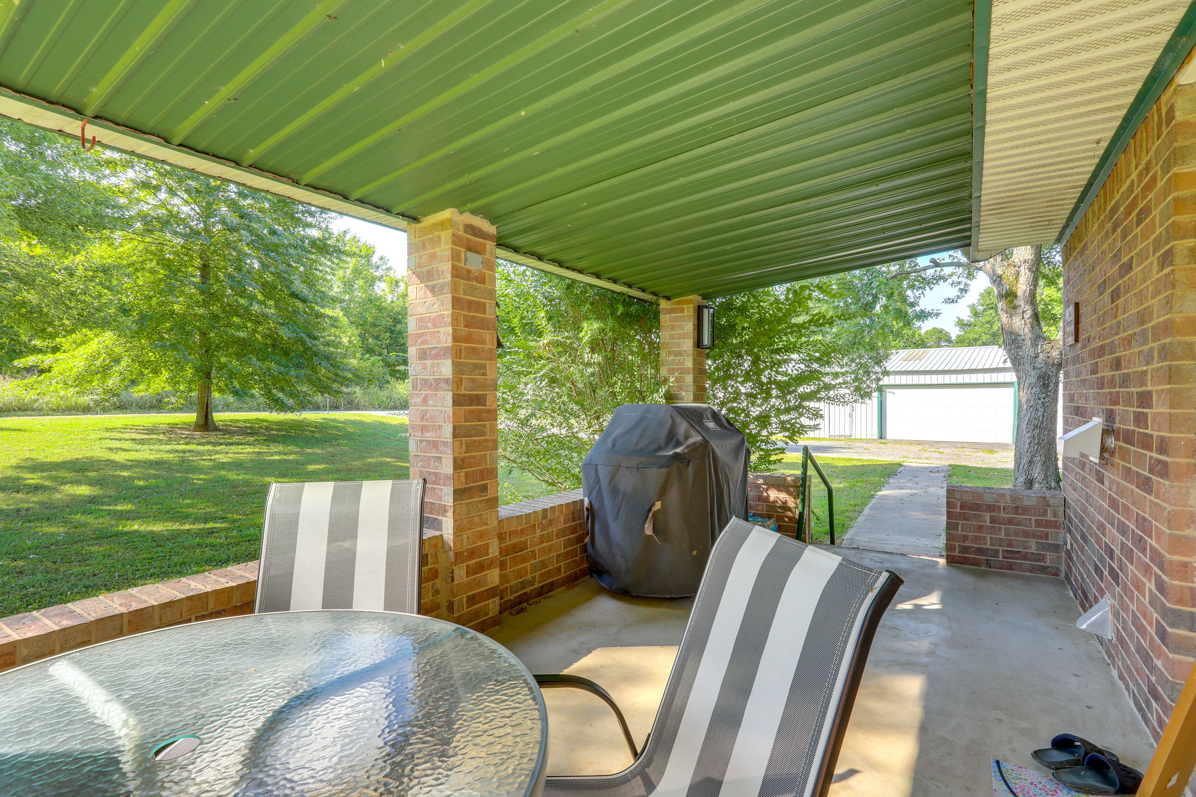 House Exterior | Addt'l Covered Porch w/ Seating & Dining Area | Gas Grill